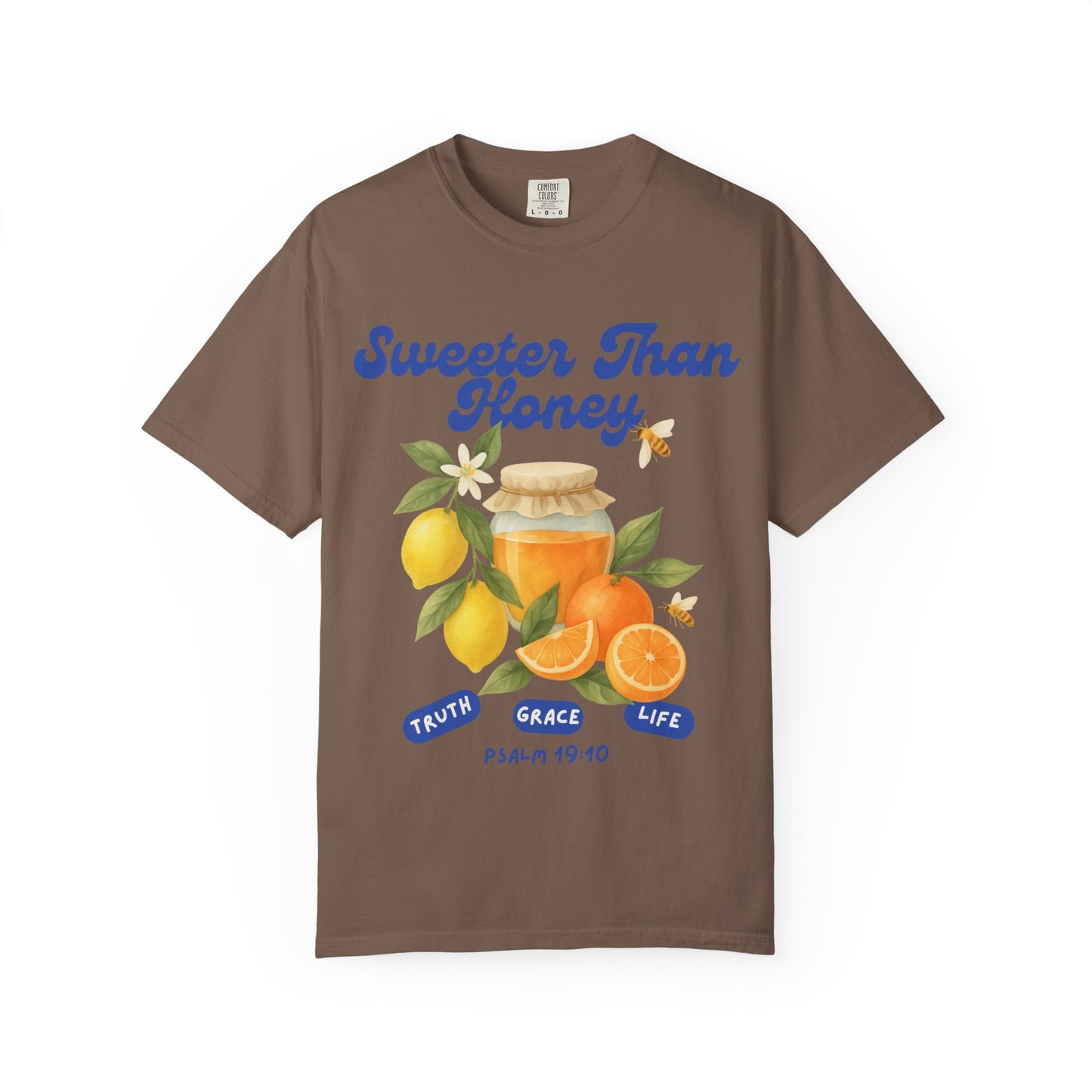 Christian t-shirt with Sweeter Than Honey Psalm 19:10 design featuring watercolor honey jar, citrus fruits, and bees