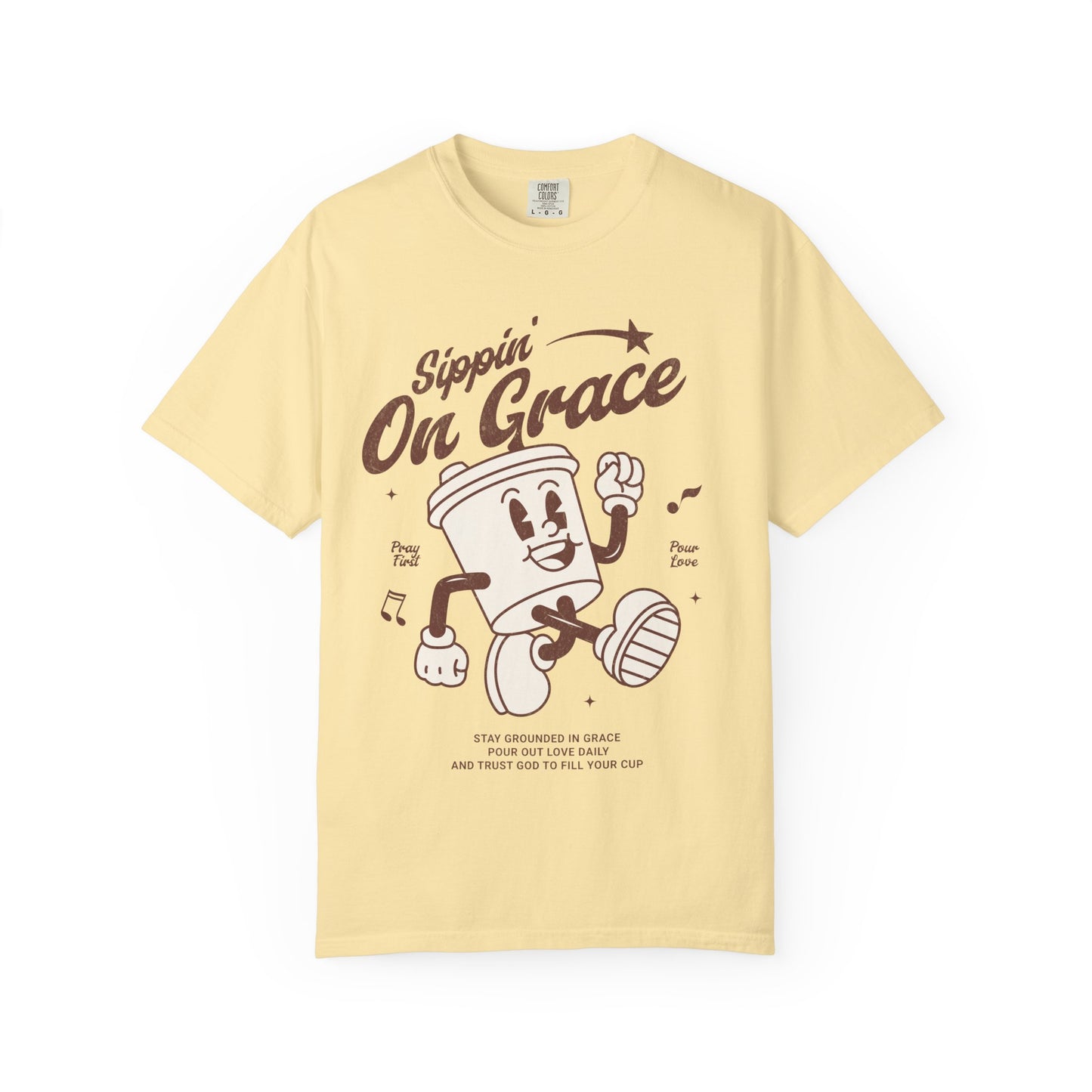 Christian t-shirt with cartoon coffee cup character and 'Sippin' On Grace' text in brown design