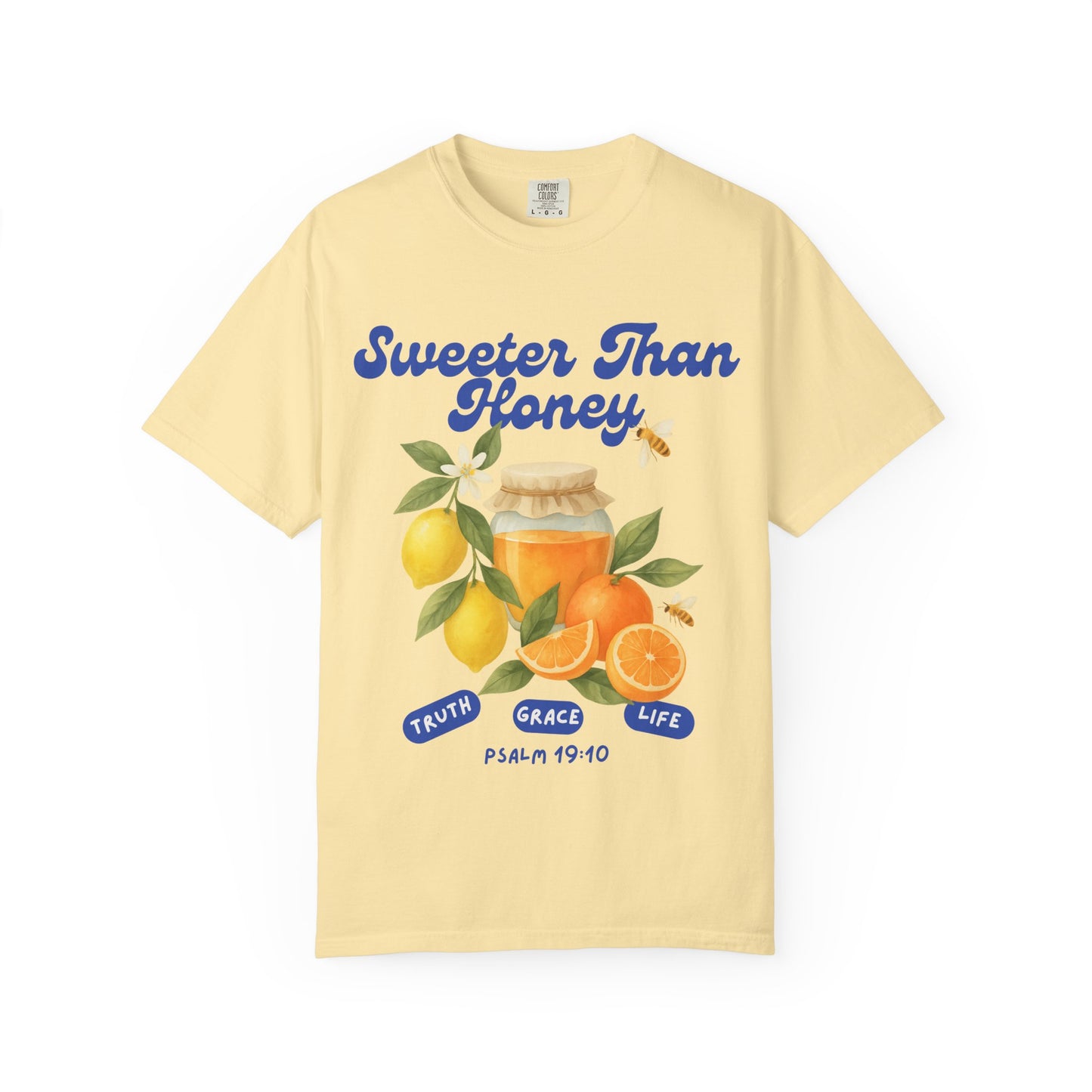 Christian t-shirt with Sweeter Than Honey Psalm 19:10 design featuring watercolor honey jar, citrus fruits, and bees