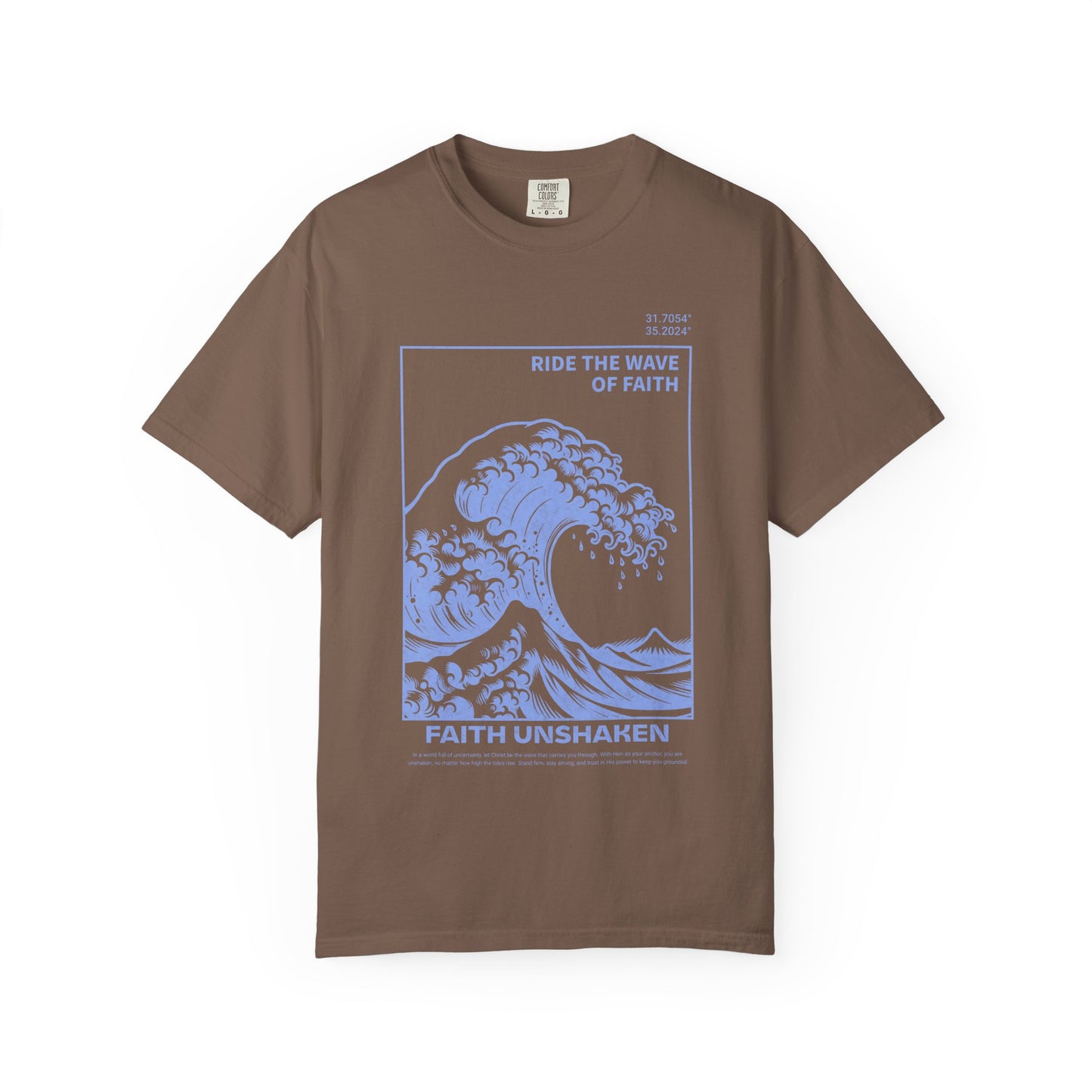 T-shirt with blue ocean wave design featuring 'Ride The Wave Of Faith' and 'Faith Unshaken' text