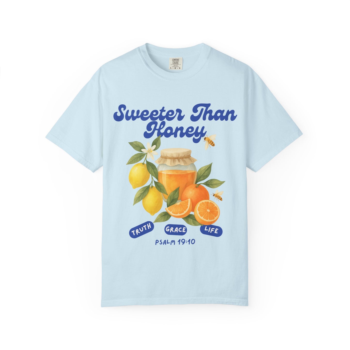 Christian t-shirt with Sweeter Than Honey Psalm 19:10 design featuring watercolor honey jar, citrus fruits, and bees