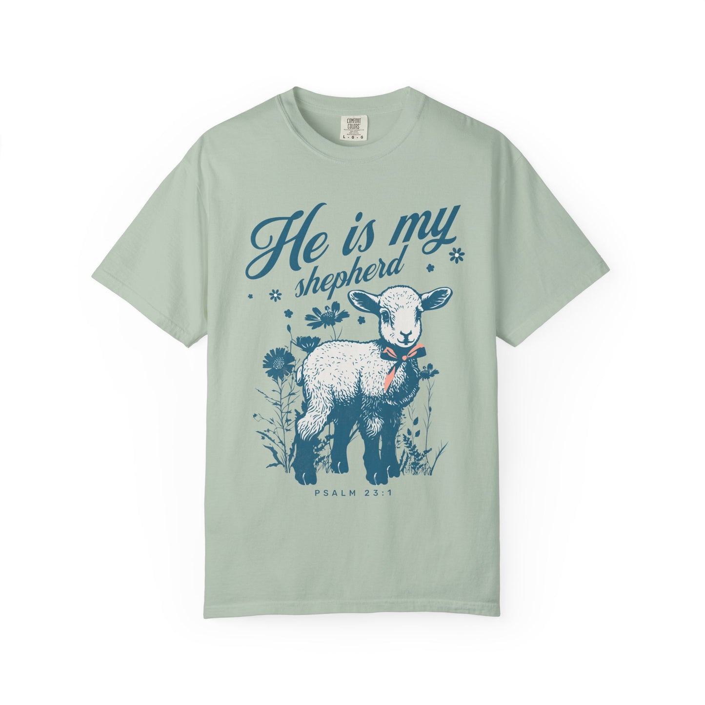 Christian t-shirt featuring adorable lamb with wildflowers and 'He Is My Shepherd' text in teal