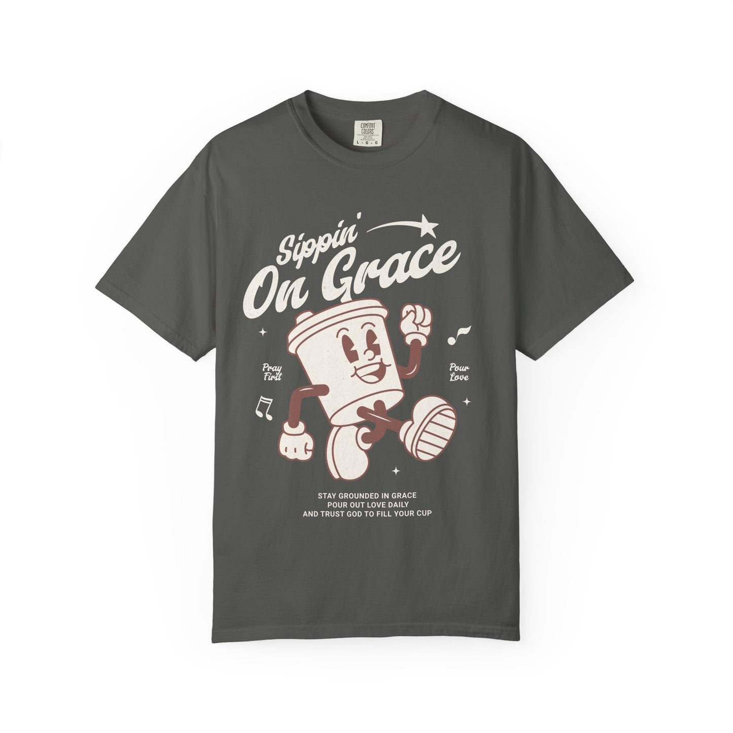 Christian t-shirt with cartoon coffee cup character and 'Sippin' On Grace' text in brown design