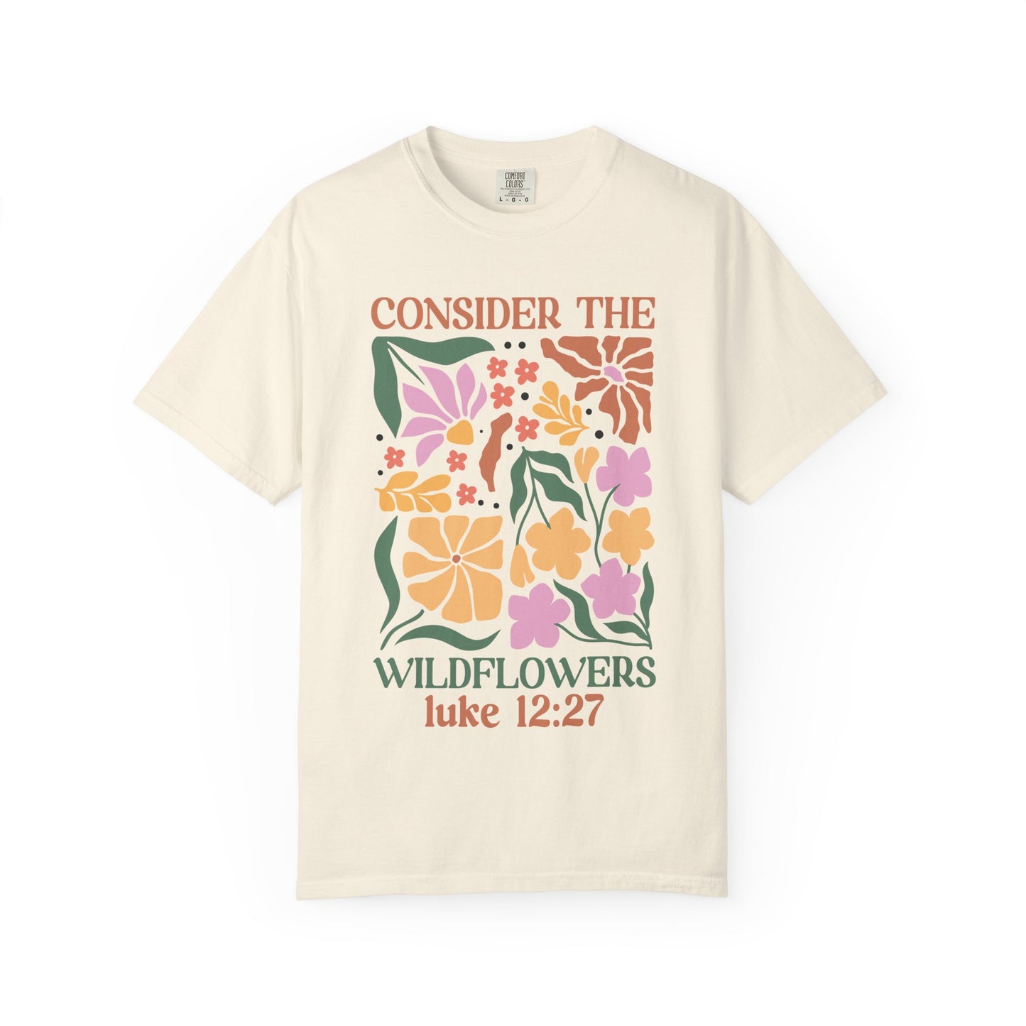 T-shirt with colorful wildflower design and 'Consider the Wildflowers Luke 12:27' bible verse text