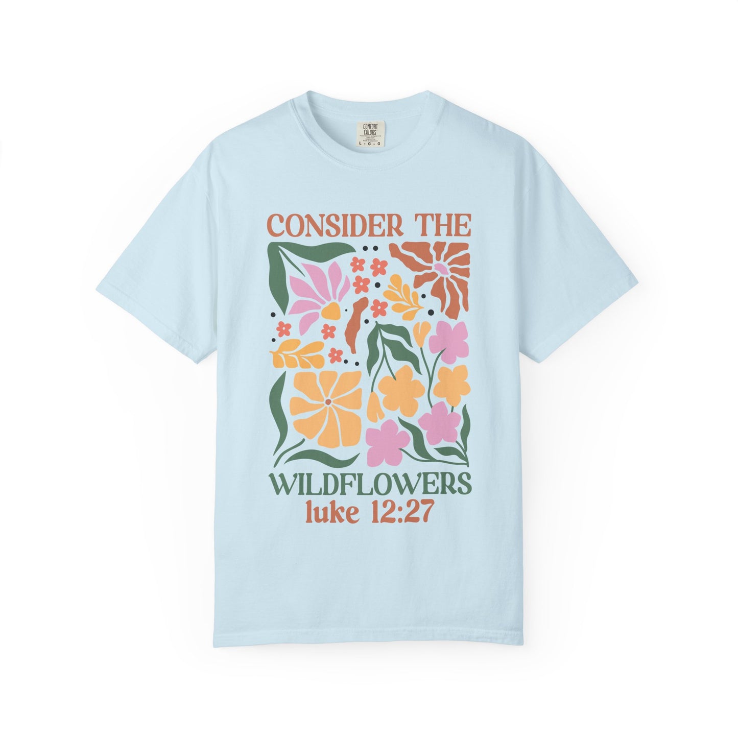 T-shirt with colorful wildflower design and 'Consider the Wildflowers Luke 12:27' bible verse text