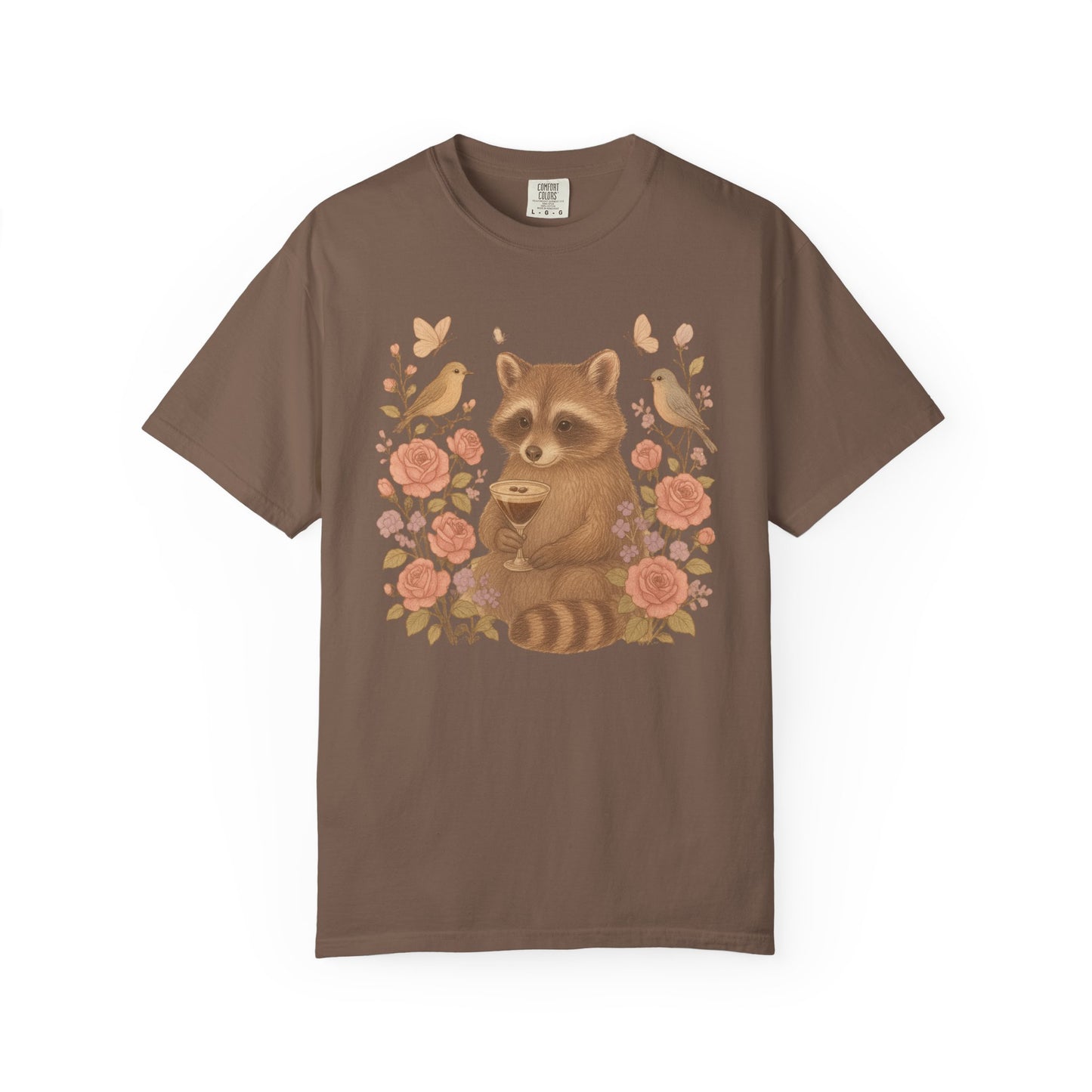 T-shirt with raccoon holding espresso martini glass surrounded by pink roses and birds