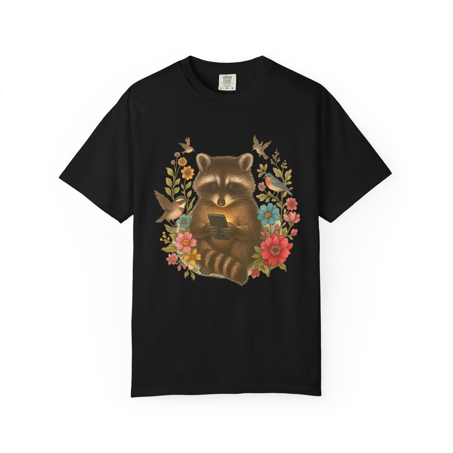 T-shirt design showing raccoon holding phone surrounded by colorful wildflowers and birds