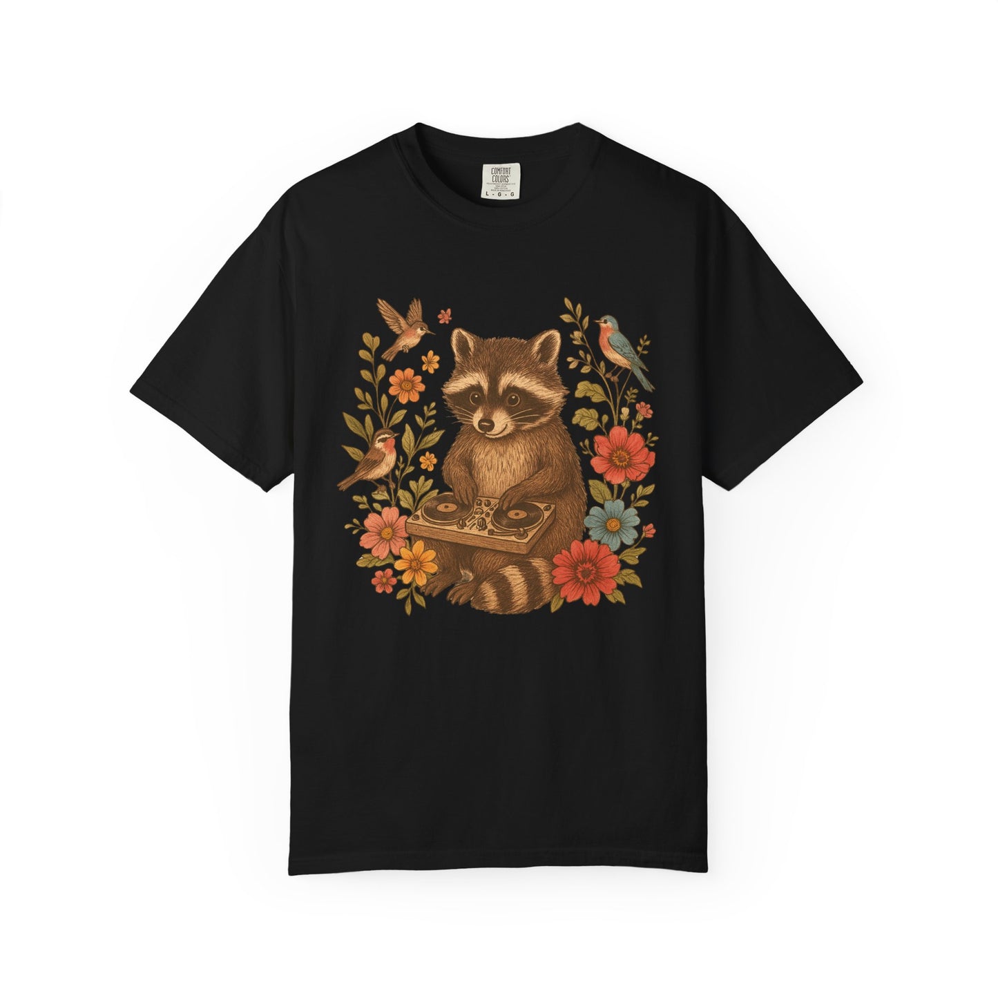 T-shirt with vintage raccoon DJ design surrounded by coral flowers, yellow blooms, and songbirds