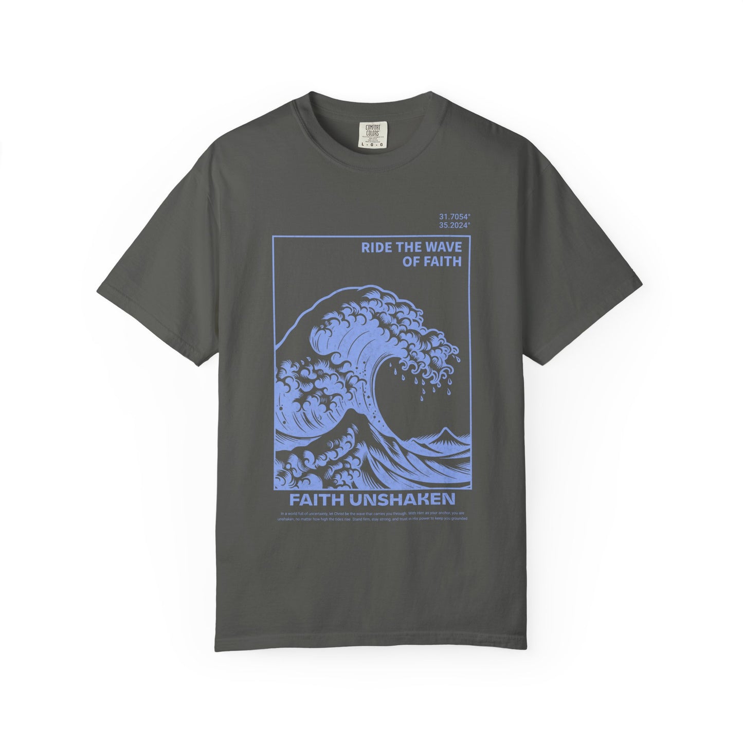T-shirt with blue ocean wave design featuring 'Ride The Wave Of Faith' and 'Faith Unshaken' text