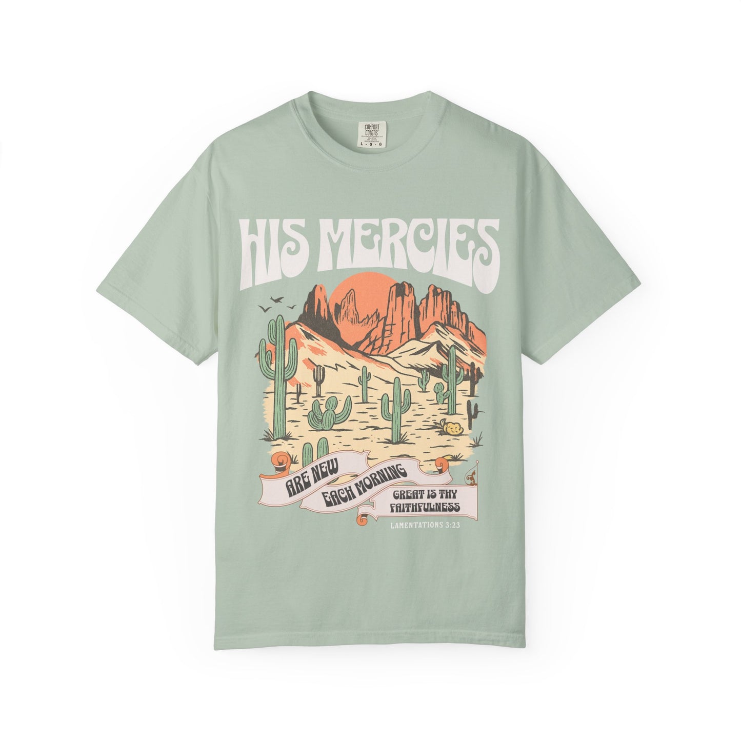Christian t-shirt with desert landscape design featuring 'His Mercies Are New Each Morning' text and Lamentations 3:23 verse