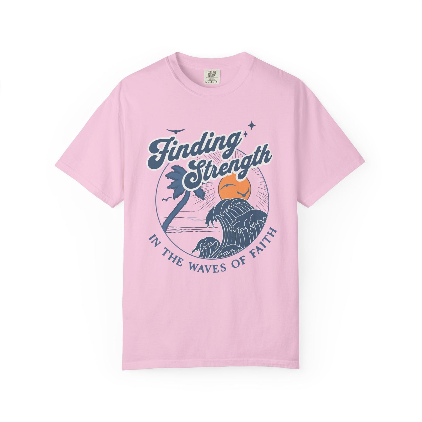 T-shirt with retro Christian design featuring palm tree, sunset, and ocean waves with Finding Strength text
