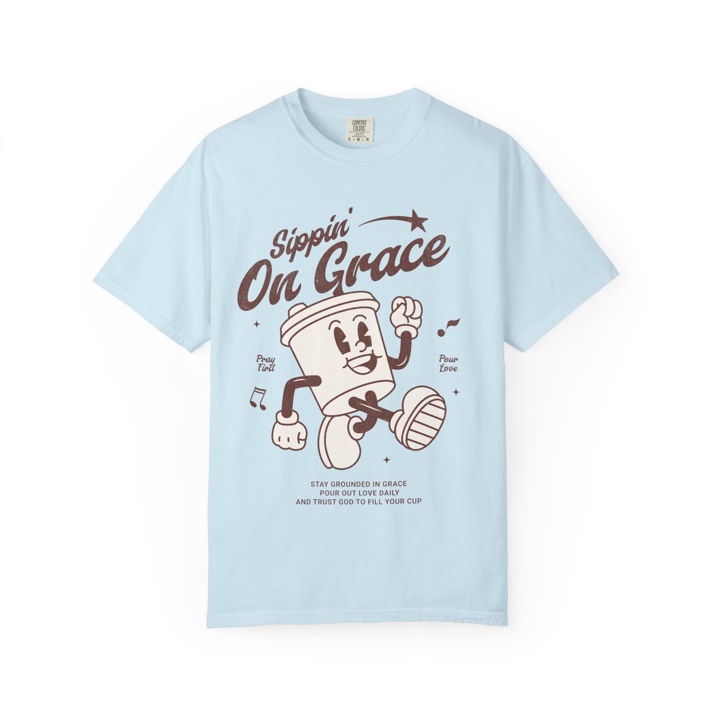 Christian t-shirt with cartoon coffee cup character and 'Sippin' On Grace' text in brown design