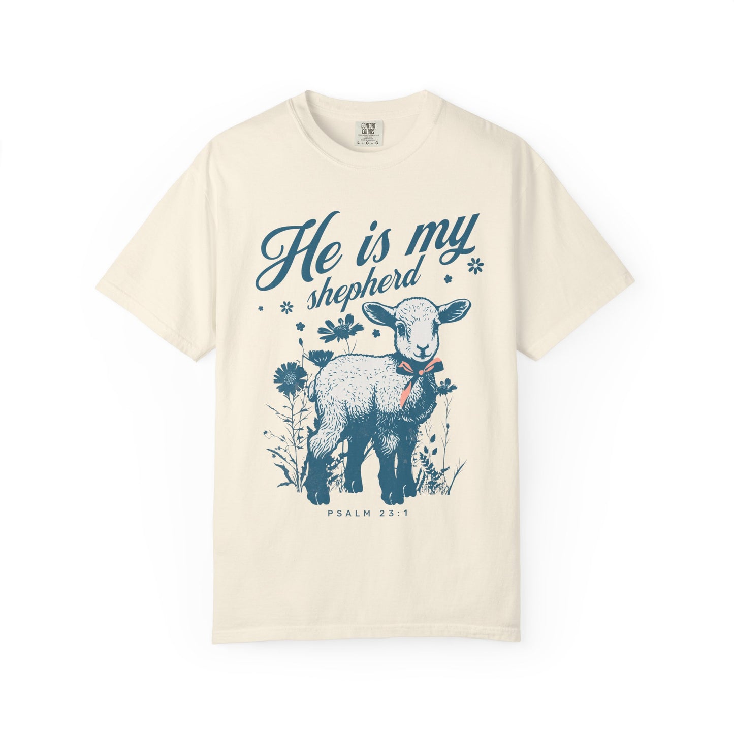 Christian t-shirt featuring adorable lamb with wildflowers and 'He Is My Shepherd' text in teal