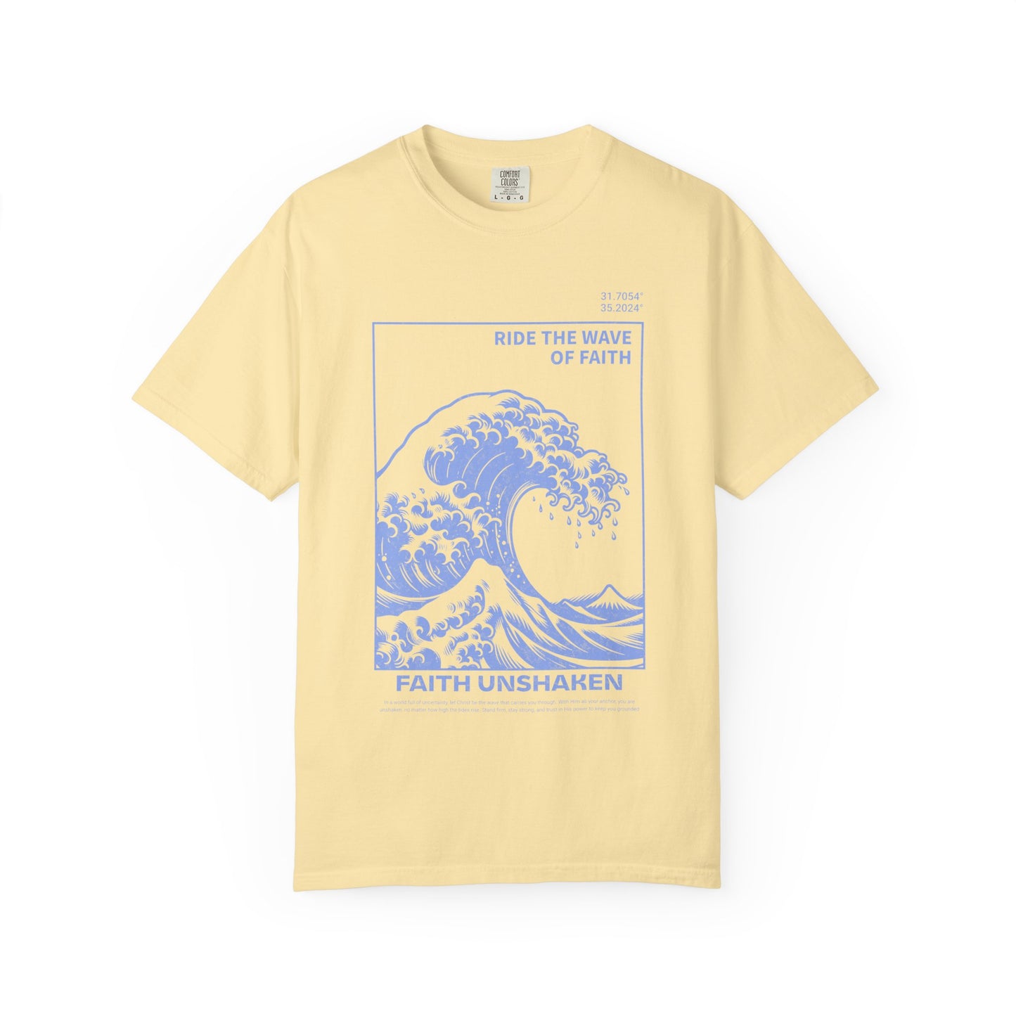 T-shirt with blue ocean wave design featuring 'Ride The Wave Of Faith' and 'Faith Unshaken' text