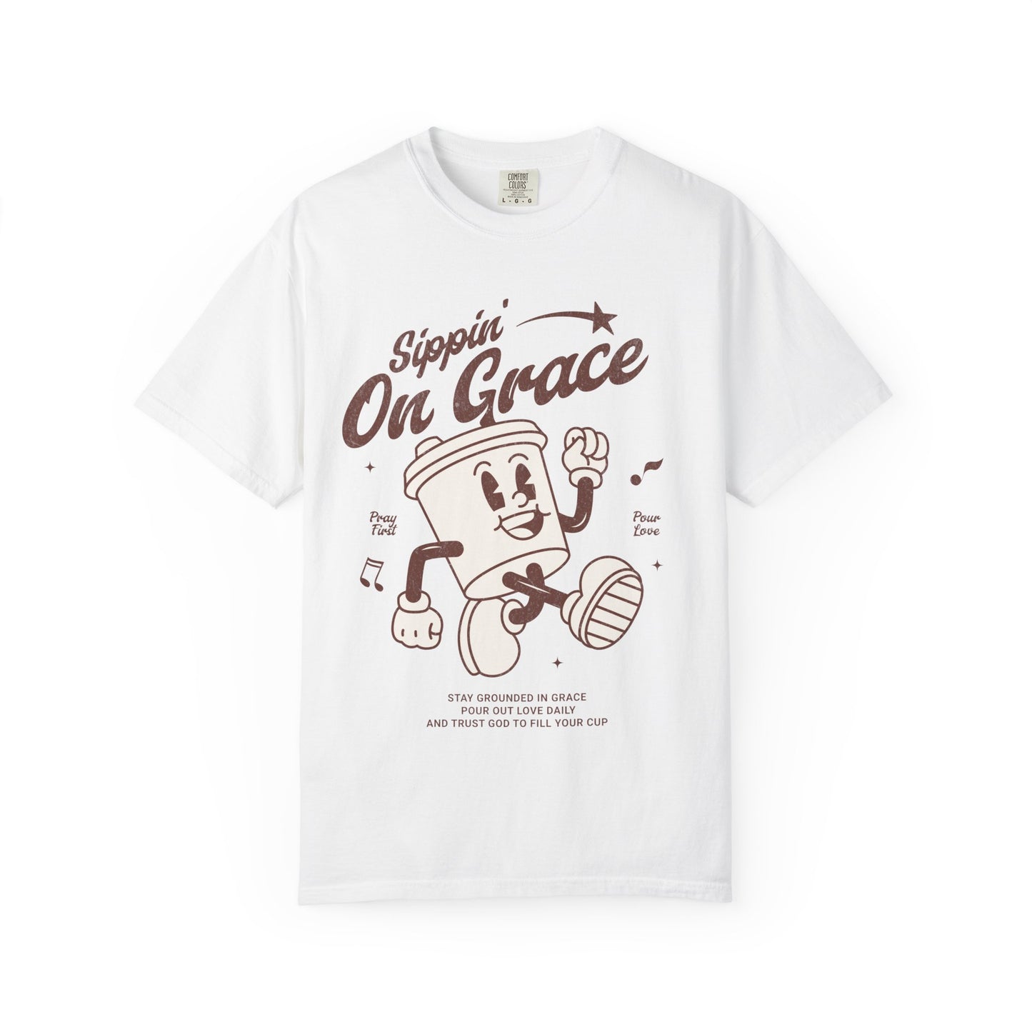 Christian t-shirt with cartoon coffee cup character and 'Sippin' On Grace' text in brown design