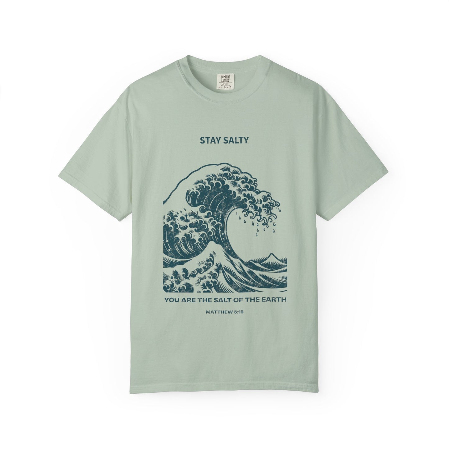 T-shirt with ocean wave design featuring Stay Salty text and Matthew 5:13 Bible verse