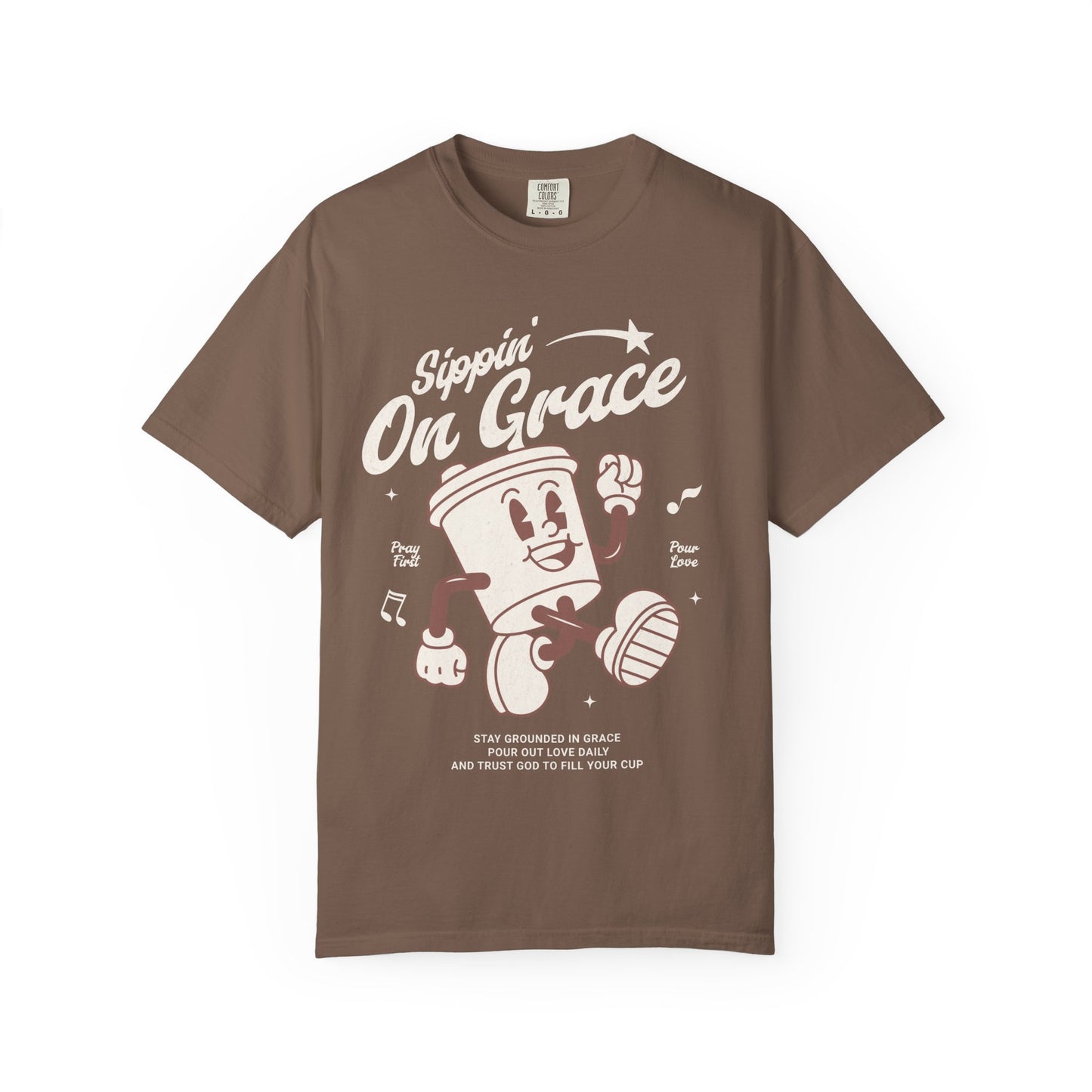 Christian t-shirt with cartoon coffee cup character and 'Sippin' On Grace' text in brown design