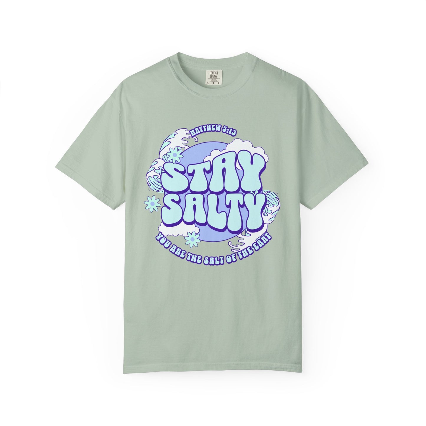 T-shirt with purple and mint green 'Stay Salty' text design featuring Matthew 5:13 scripture and retro styling