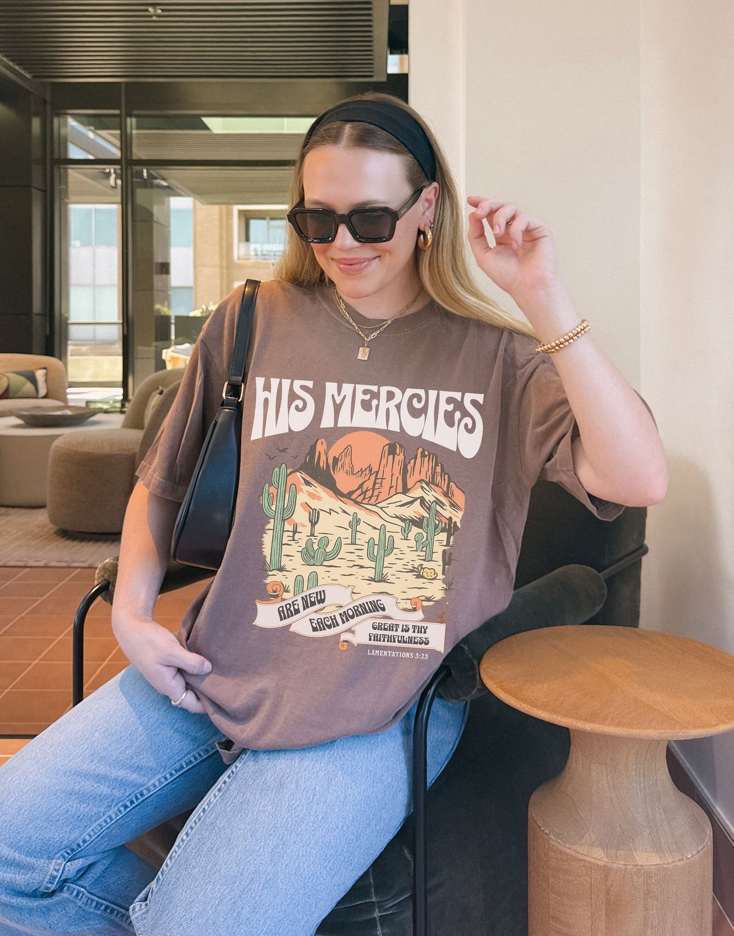 Christian t-shirt with desert landscape design featuring 'His Mercies Are New Each Morning' text and Lamentations 3:23 verse
