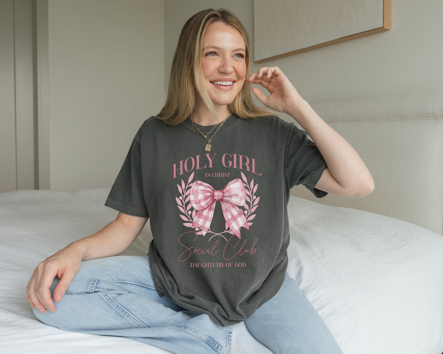 Tshirt with Holy Girl Social Club design featuring pink gingham bow and floral elements