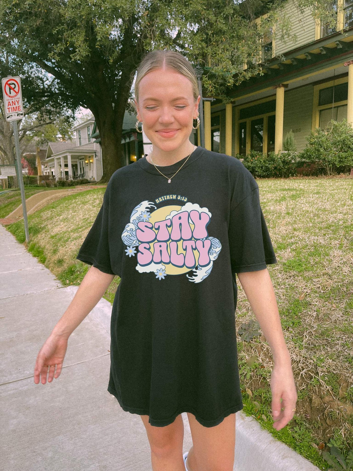 T-shirt with wavy font Stay Salty Matthew 5:13 text in pink bubble letters with ocean waves and flowers