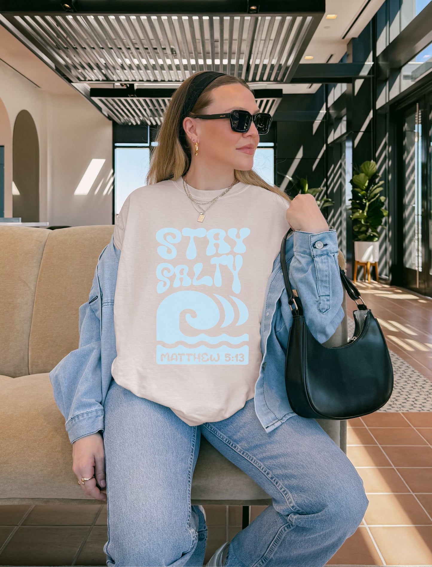 Christian t-shirt with 'Stay Salty' text and ocean wave design referencing Matthew 5:13