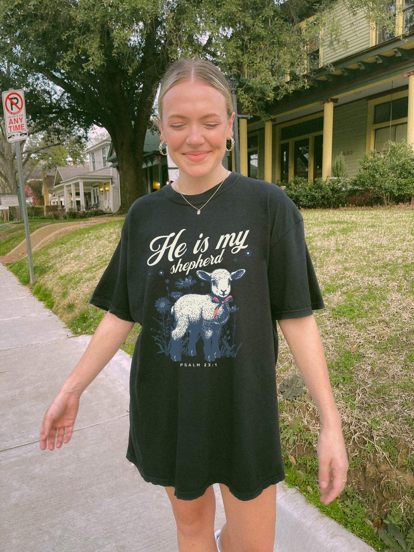 Christian t-shirt featuring adorable lamb with wildflowers and 'He Is My Shepherd' text in teal