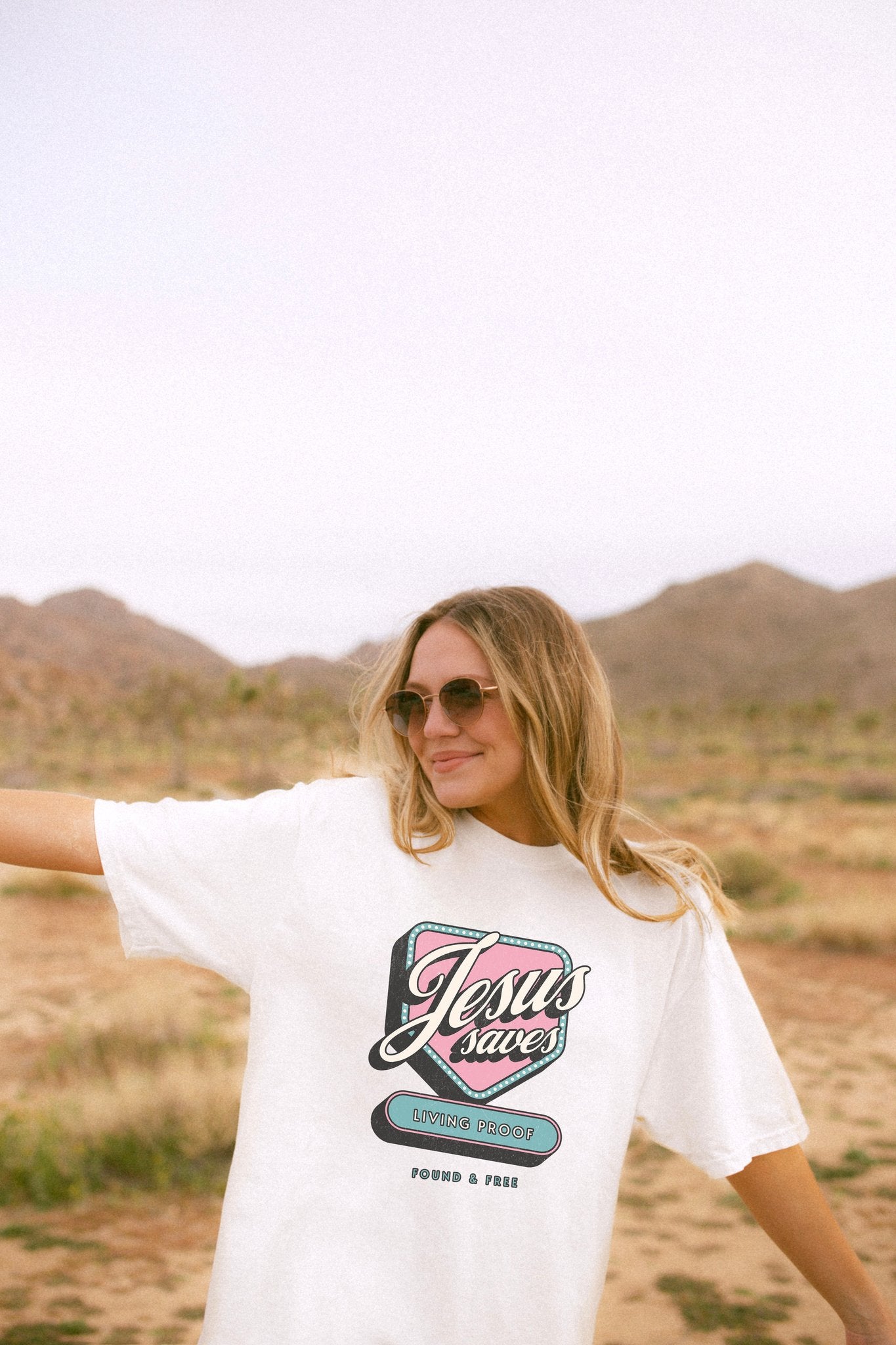 T-shirt with retro Jesus Saves design in pink and blue with distressed vintage styling