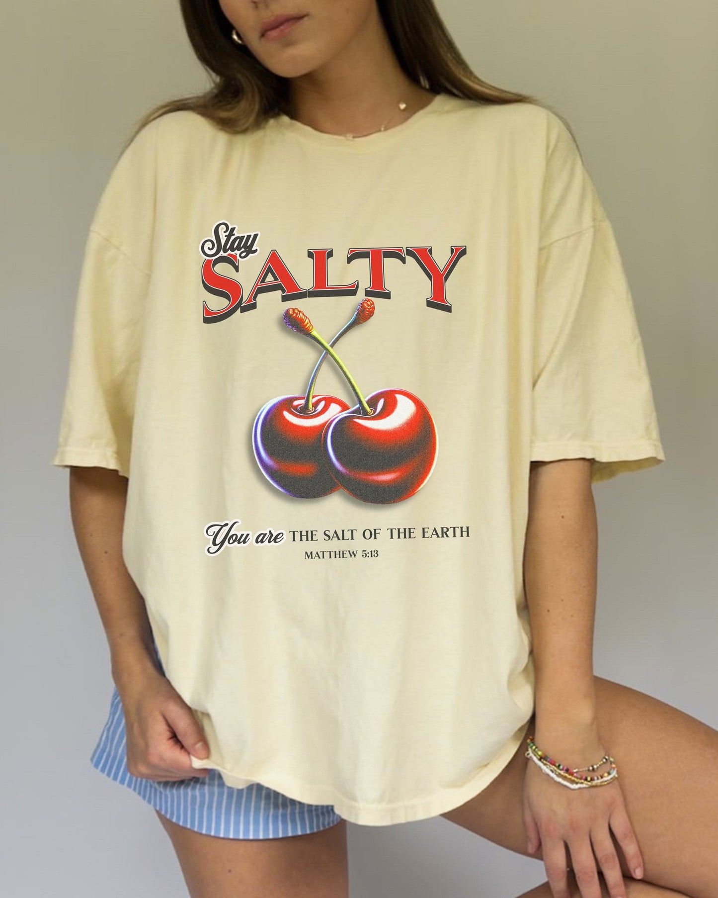 T-shirt with retro Stay Salty text and vintage cherry design featuring Matthew 5:13 scripture