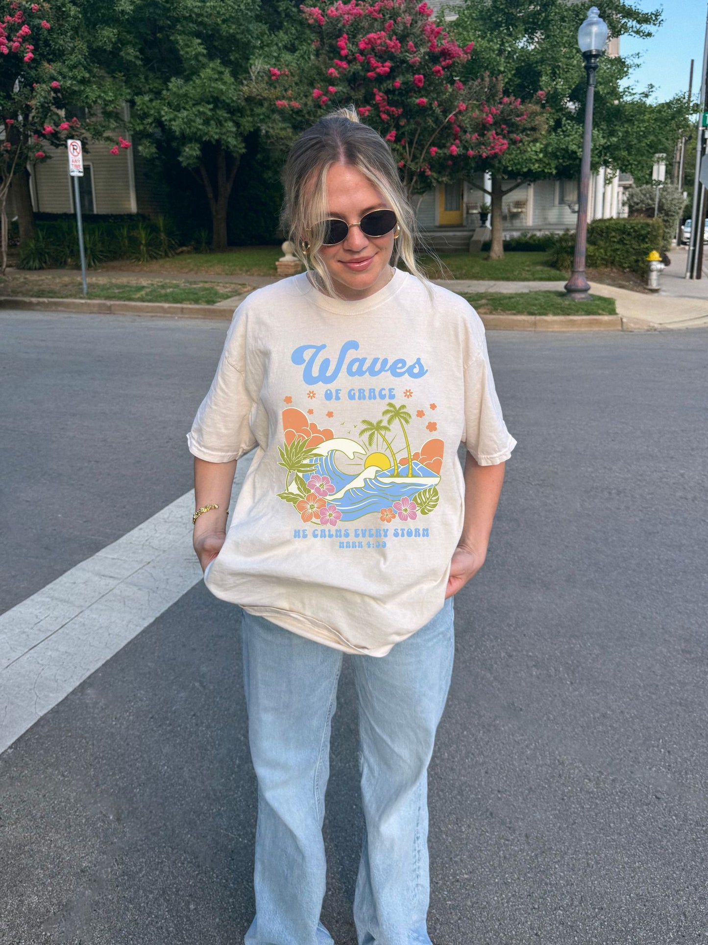 T-shirt with tropical ocean waves, palm trees, hibiscus flowers and 'Waves of Grace' scripture design