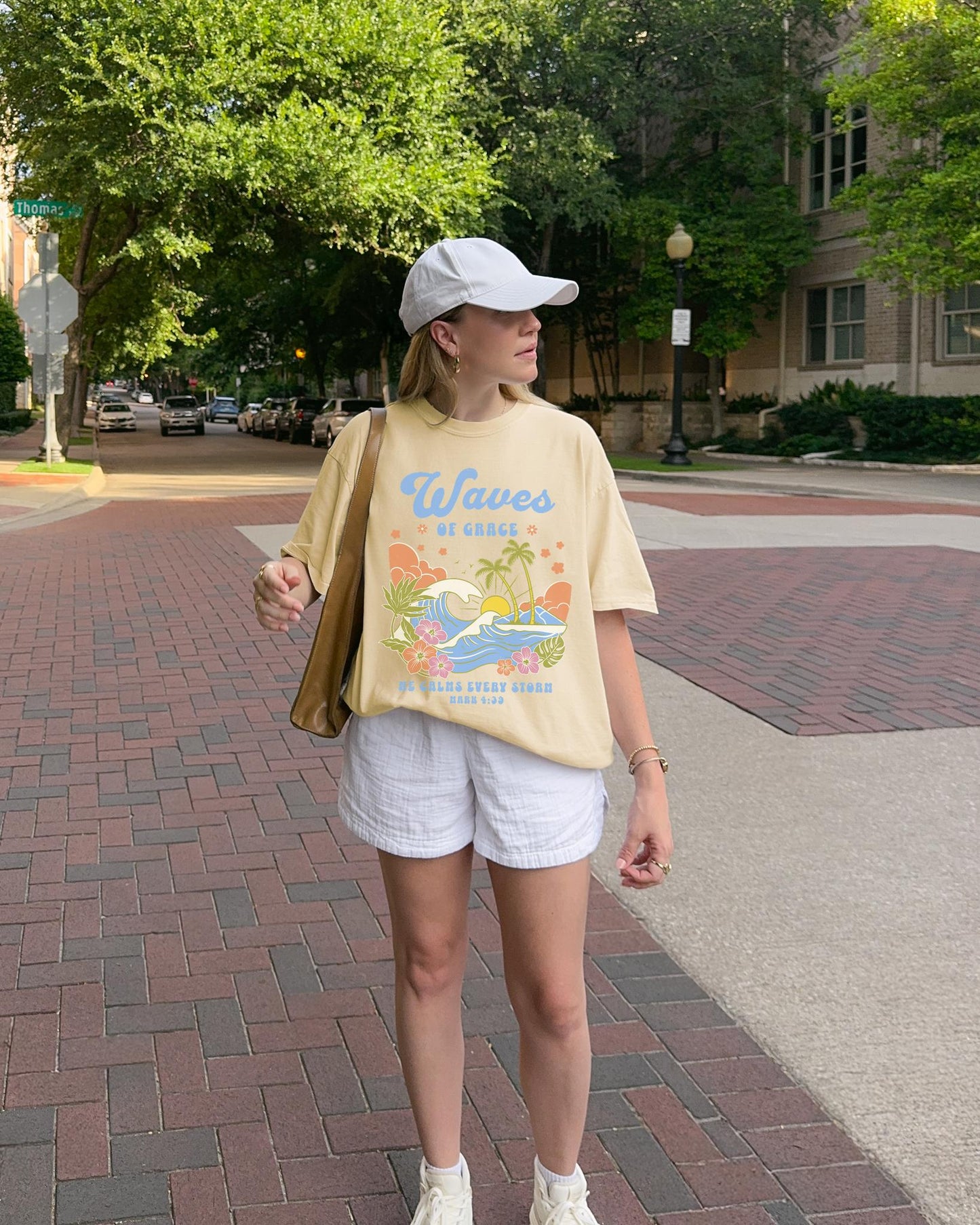 T-shirt with tropical ocean waves, palm trees, hibiscus flowers and 'Waves of Grace' scripture design