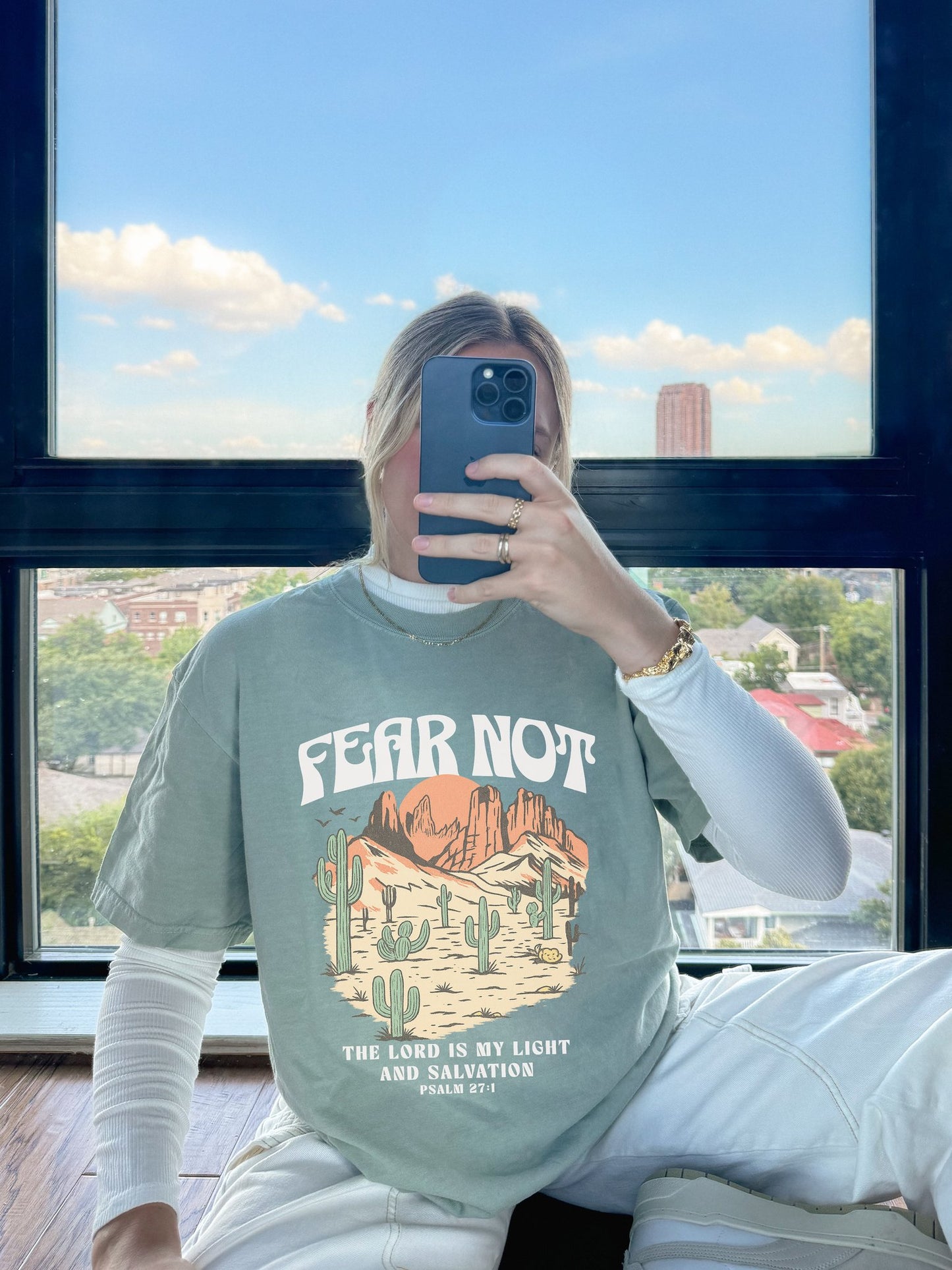 T-shirt with Fear Not text above desert scene with cacti, red rocks, and Psalm 27:1 verse below