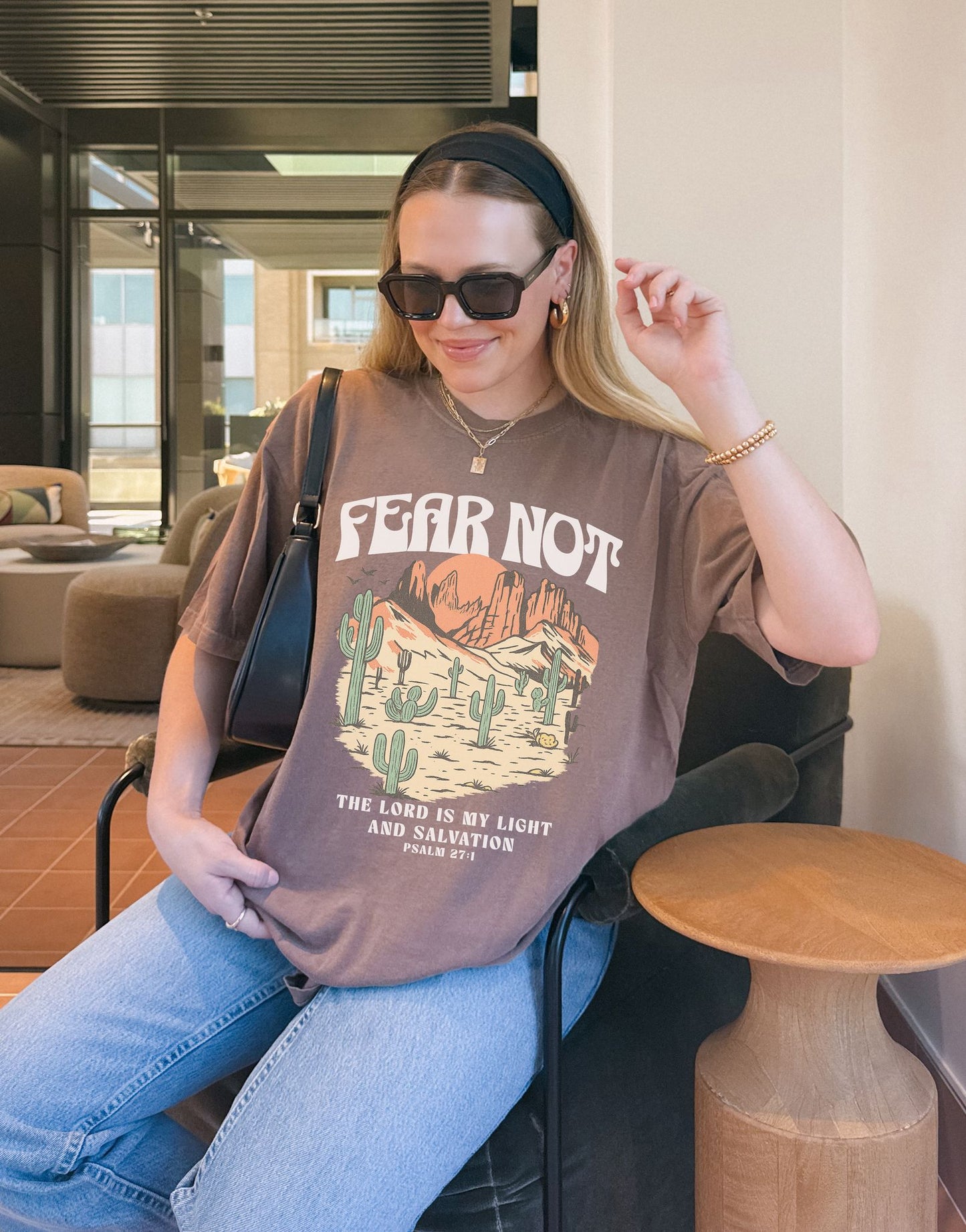 T-shirt with Fear Not text above desert scene with cacti, red rocks, and Psalm 27:1 verse below