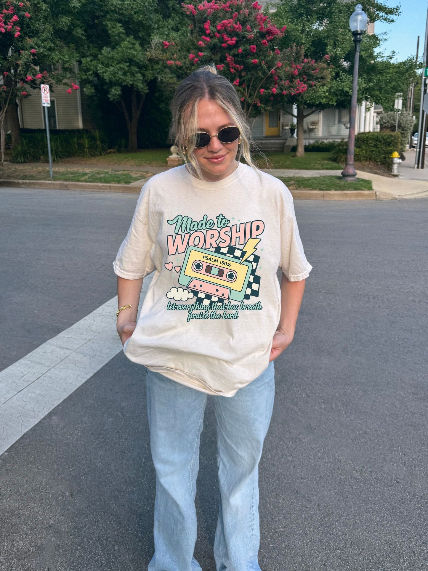 T-shirt with retro cassette tape design featuring 'Made to Worship' text and Psalm 150:6 scripture in pastel colors