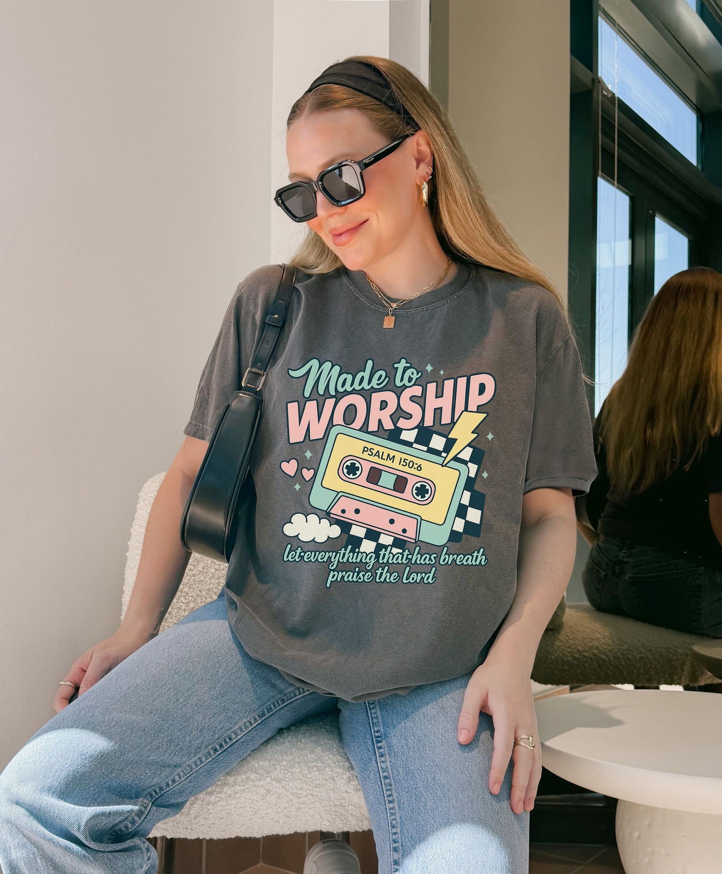T-shirt with retro cassette tape design featuring 'Made to Worship' text and Psalm 150:6 scripture in pastel colors