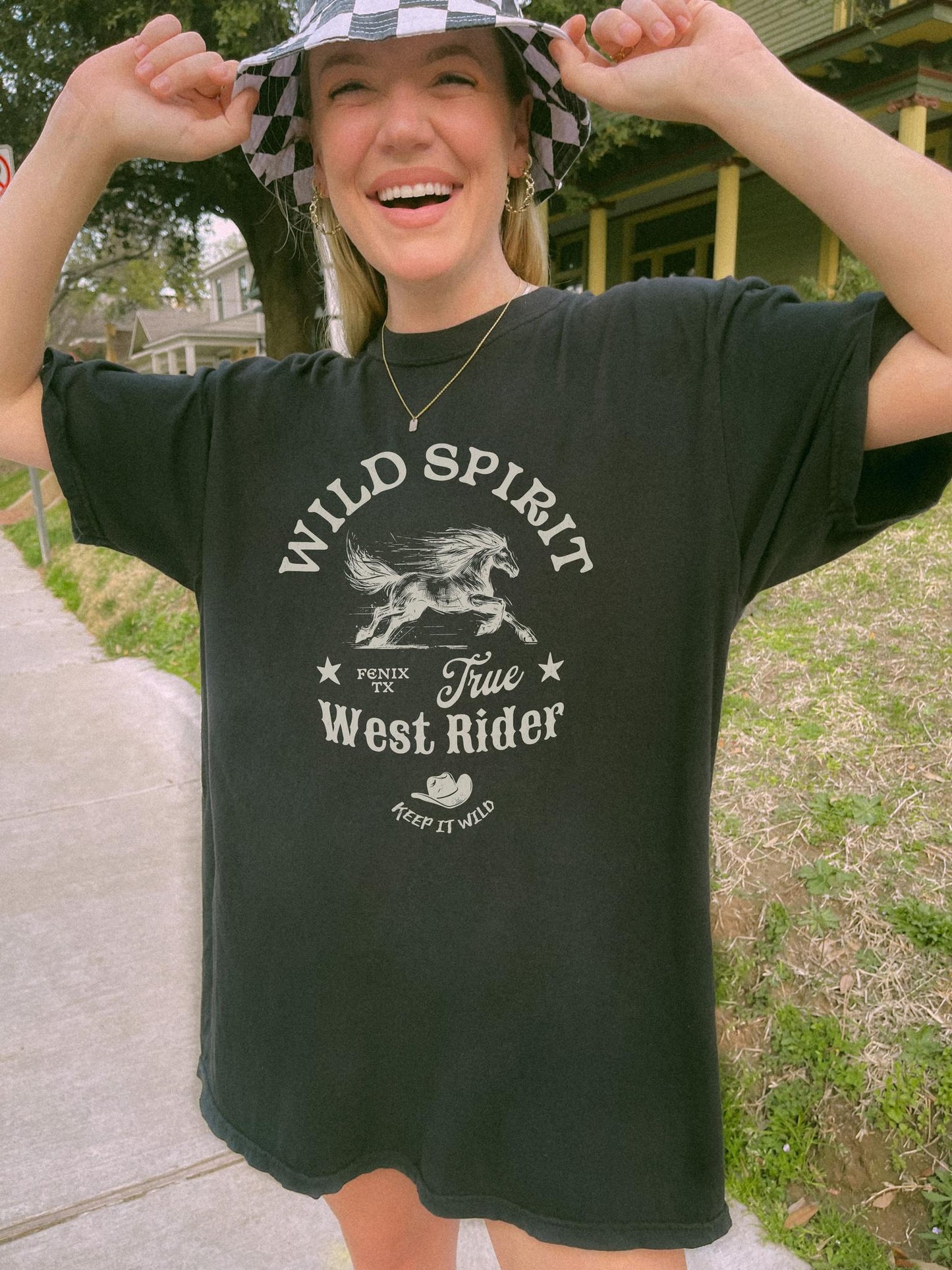 Western t-shirt with galloping horse design, Fenix Texas text, and cowboy hat graphic in vintage style