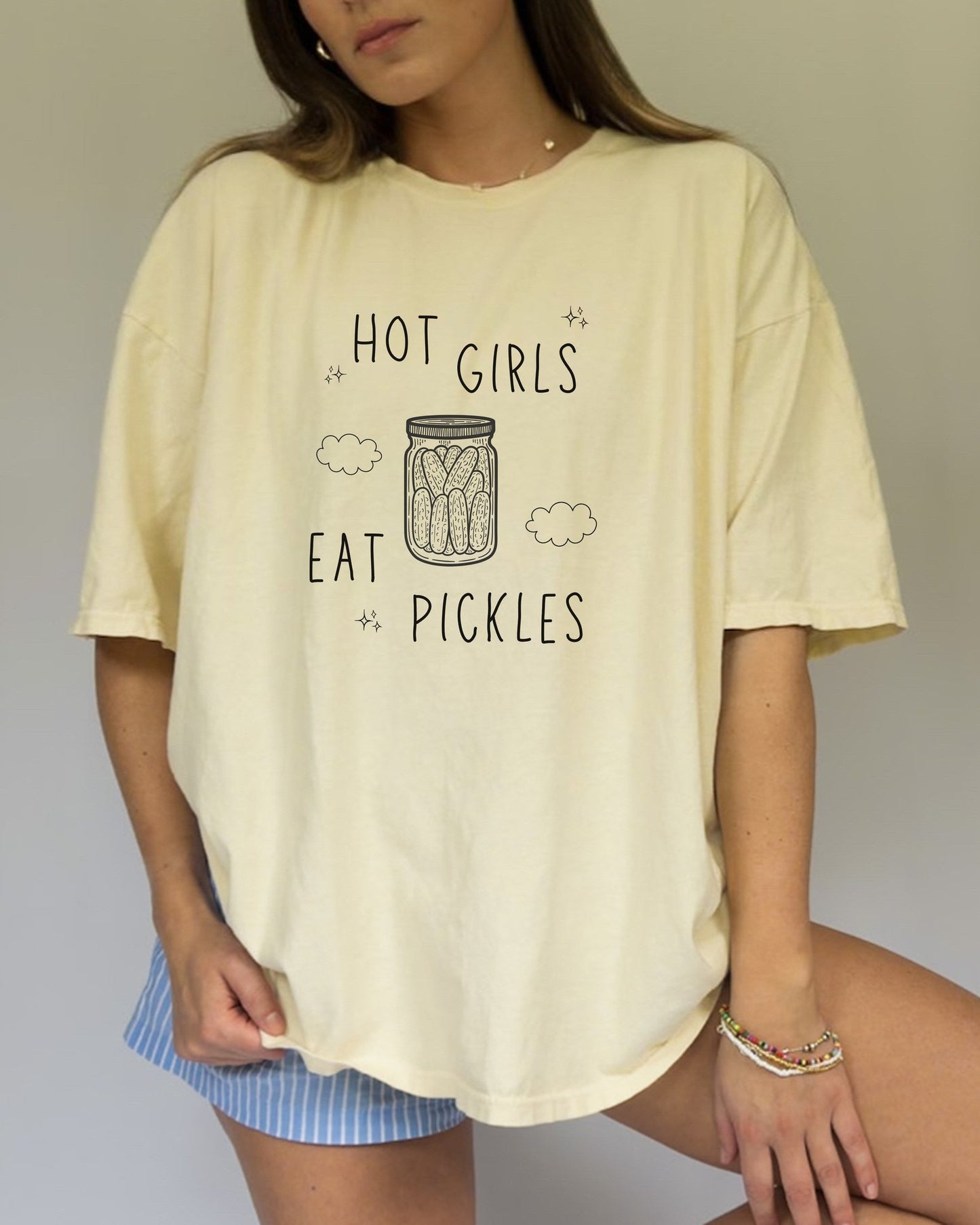 T-shirt with hand-lettered 'Hot Girls Eat Pickles' text and illustrated pickle jar with clouds