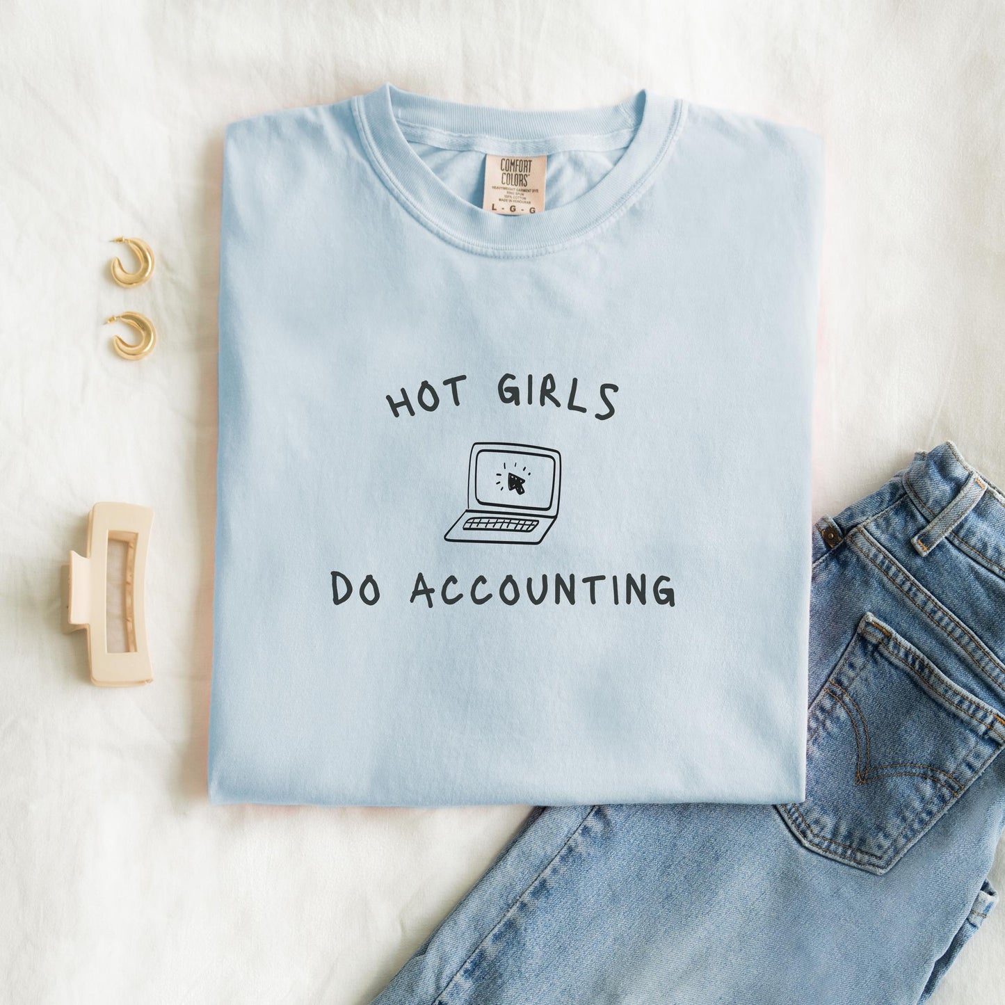 T-shirt with 'Hot Girls Do Accounting' text and laptop computer graphic in black ink