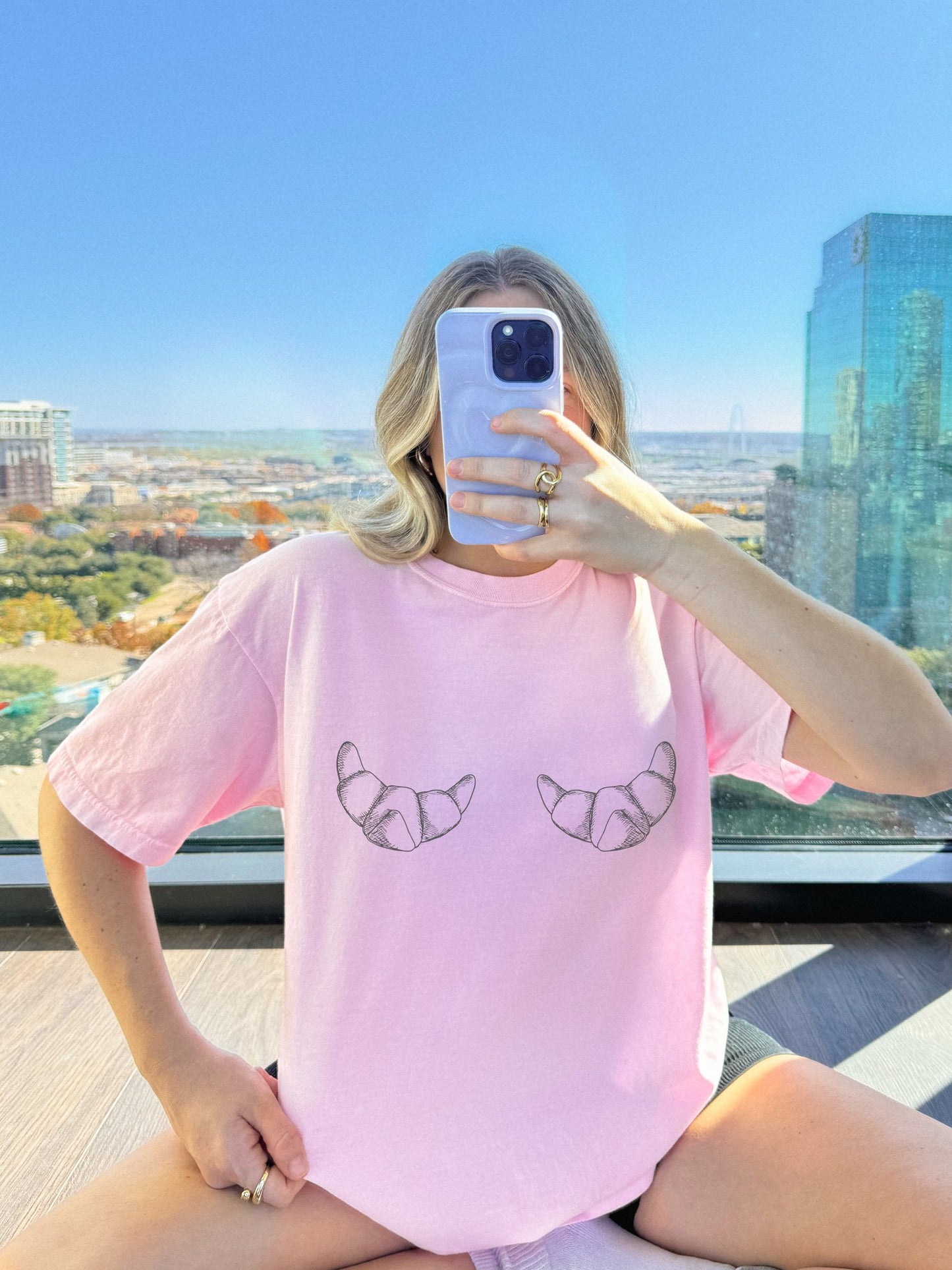 T-shirt with hand-drawn croissant illustrations featuring detailed pastry sketches