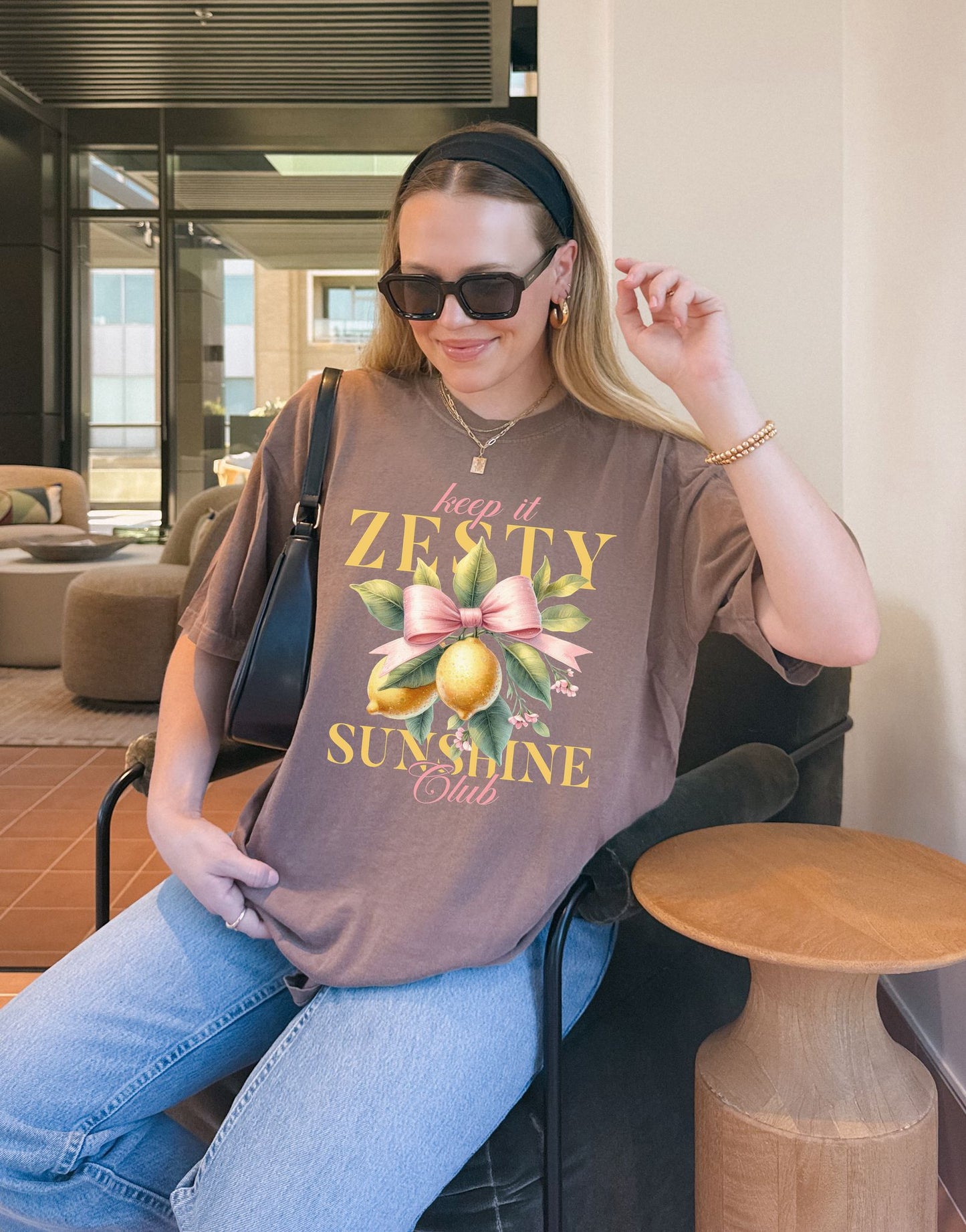 T-shirt with Keep It Zesty Sunshine Club text featuring watercolor lemons with pink bow and green leaves