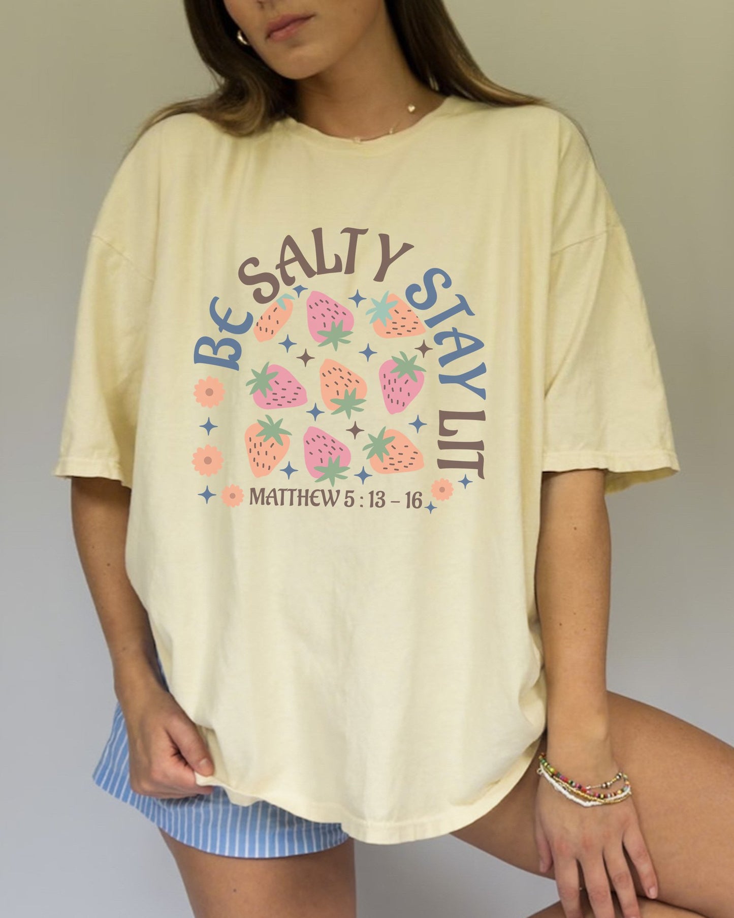Be Salty t-shirt design with pink and orange strawberries, flowers, and Matthew 5:13-16 scripture