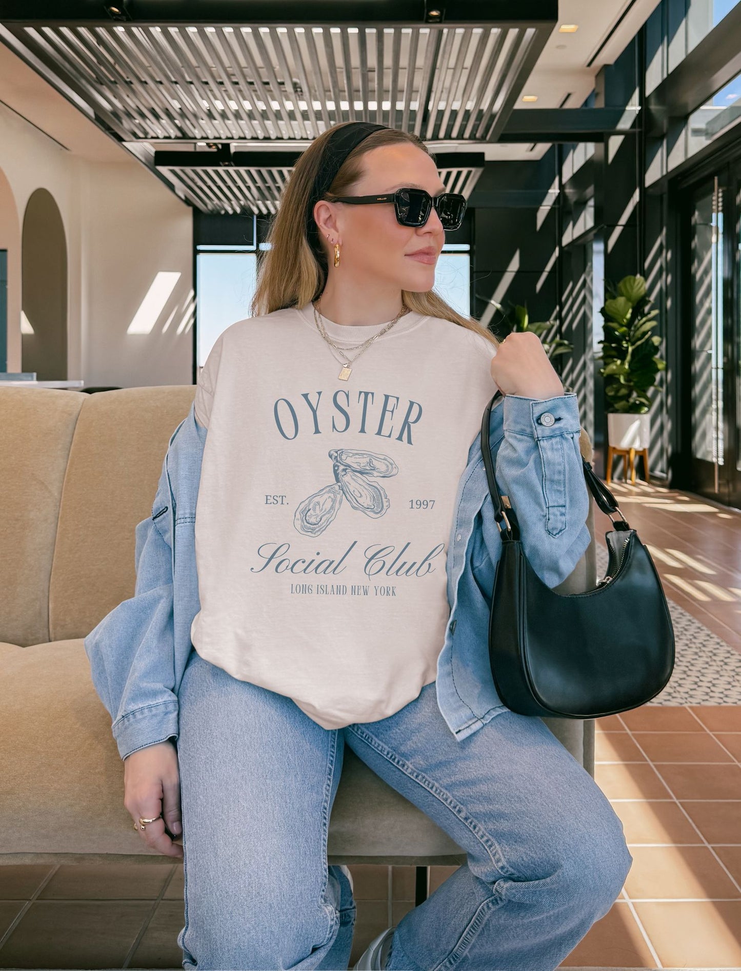 T-shirt with vintage oyster social club design featuring three detailed oyster illustrations