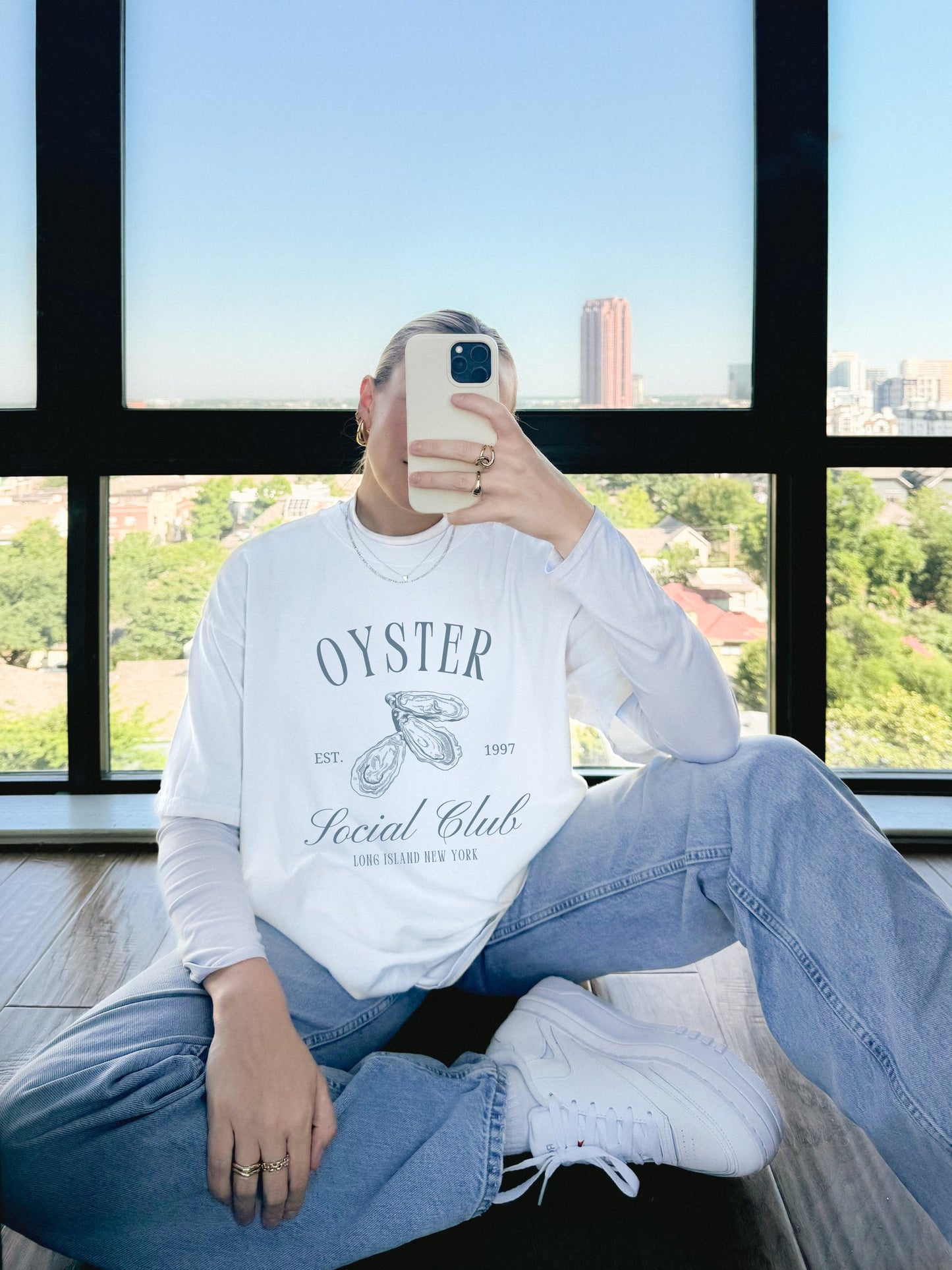 T-shirt with vintage oyster social club design featuring three detailed oyster illustrations