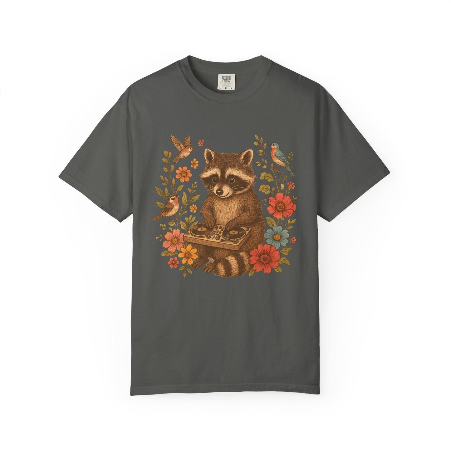 T-shirt with vintage raccoon DJ design surrounded by coral flowers, yellow blooms, and songbirds