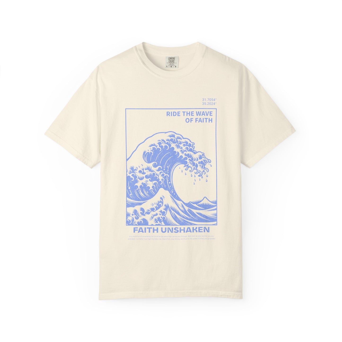 T-shirt with blue ocean wave design featuring 'Ride The Wave Of Faith' and 'Faith Unshaken' text