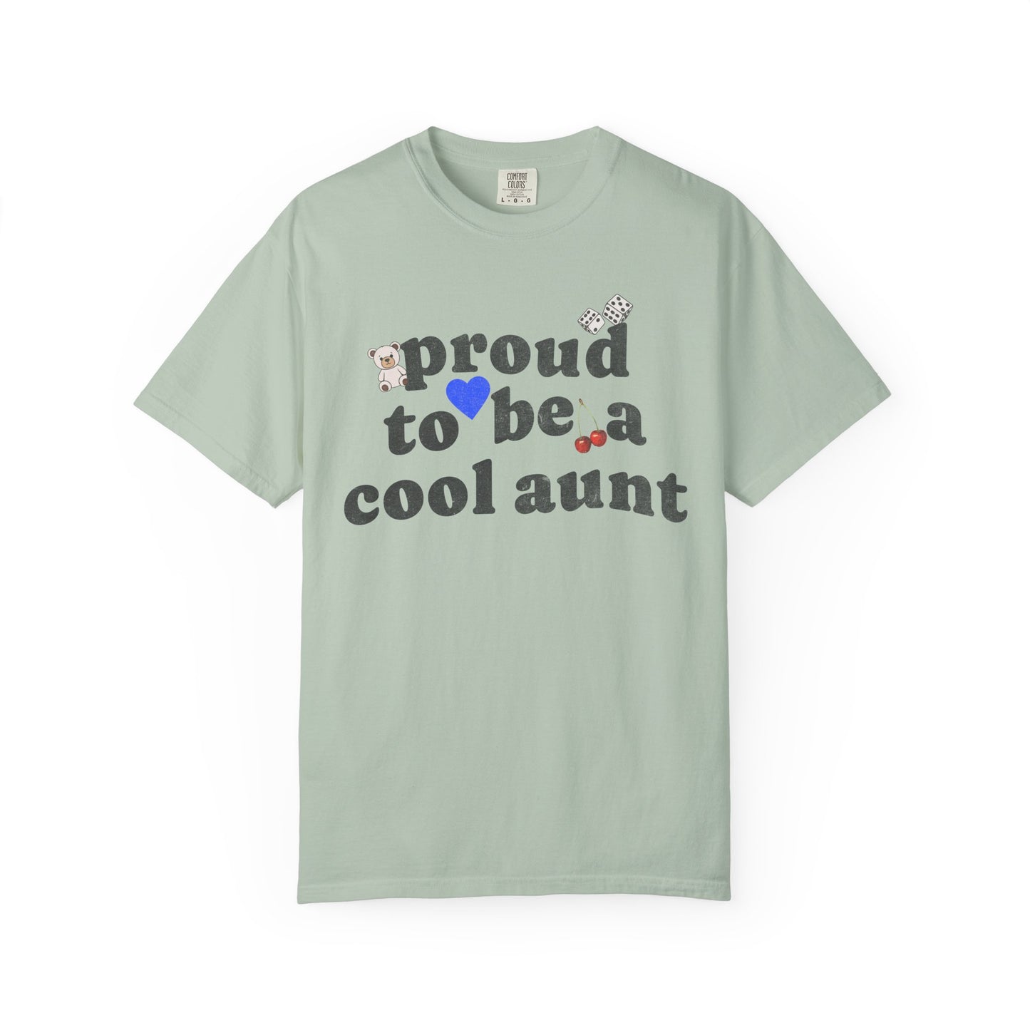 T-shirt with retro distressed text 'proud to be a cool aunt' decorated with teddy bear, blue heart, dice, and cherries