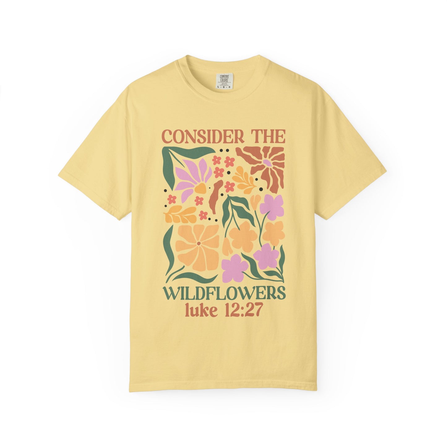 T-shirt with colorful wildflower design and 'Consider the Wildflowers Luke 12:27' bible verse text