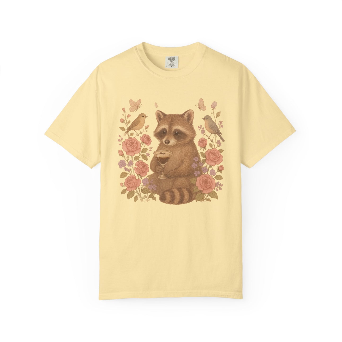 T-shirt with raccoon holding espresso martini glass surrounded by pink roses and birds