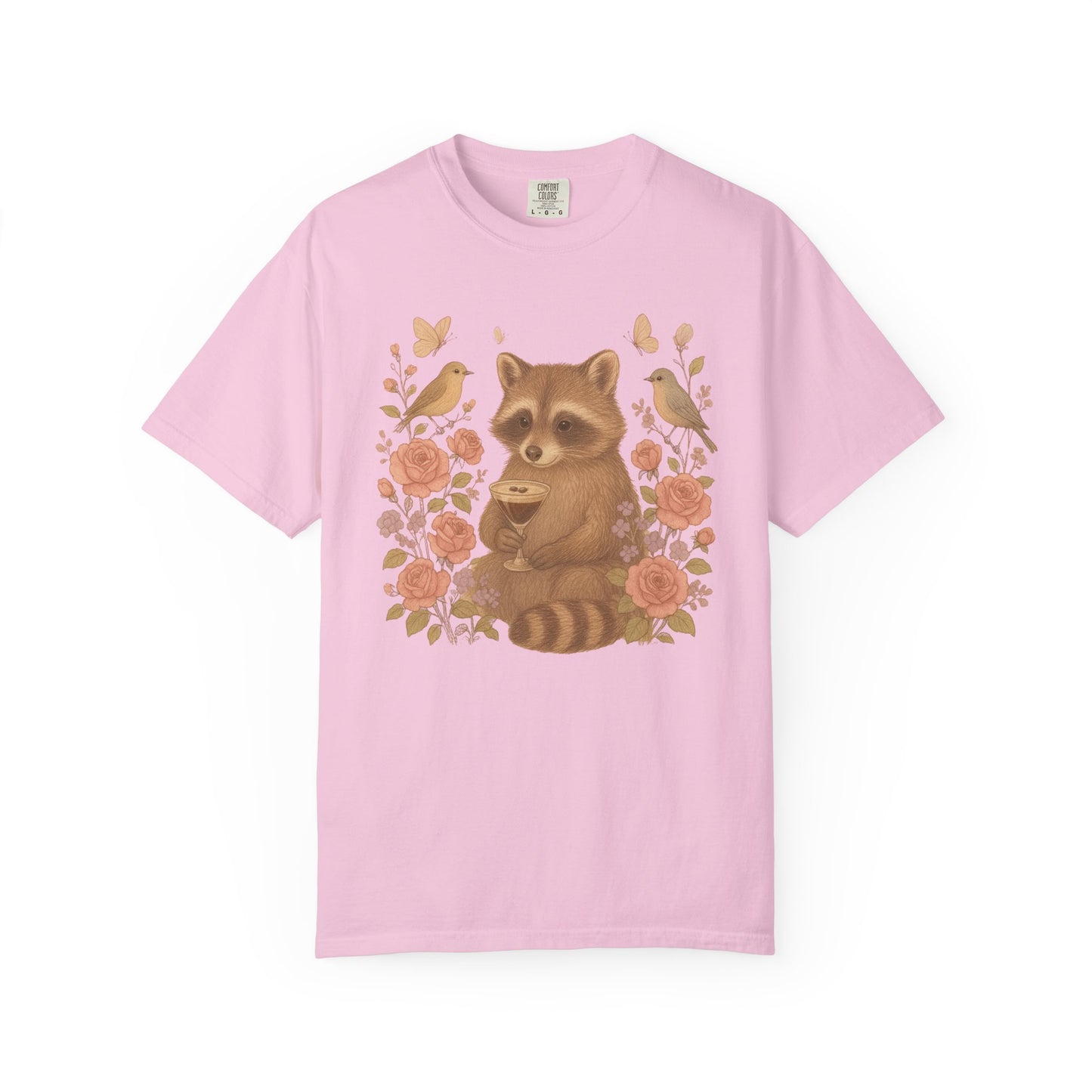 T-shirt with raccoon holding espresso martini glass surrounded by pink roses and birds