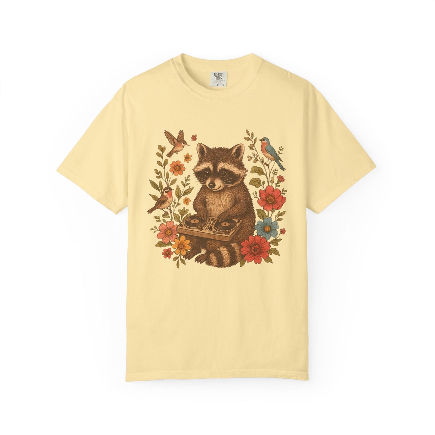 T-shirt with vintage raccoon DJ design surrounded by coral flowers, yellow blooms, and songbirds